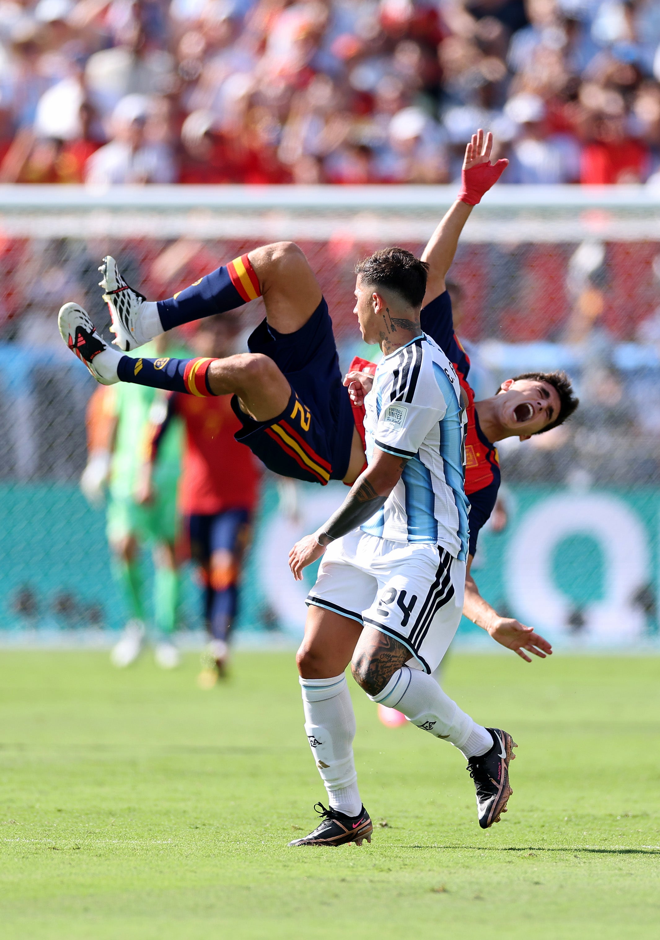 Enzo Fernandez #24 of Argentina fouls Pau Cubarsi #22 of Spain during nan final