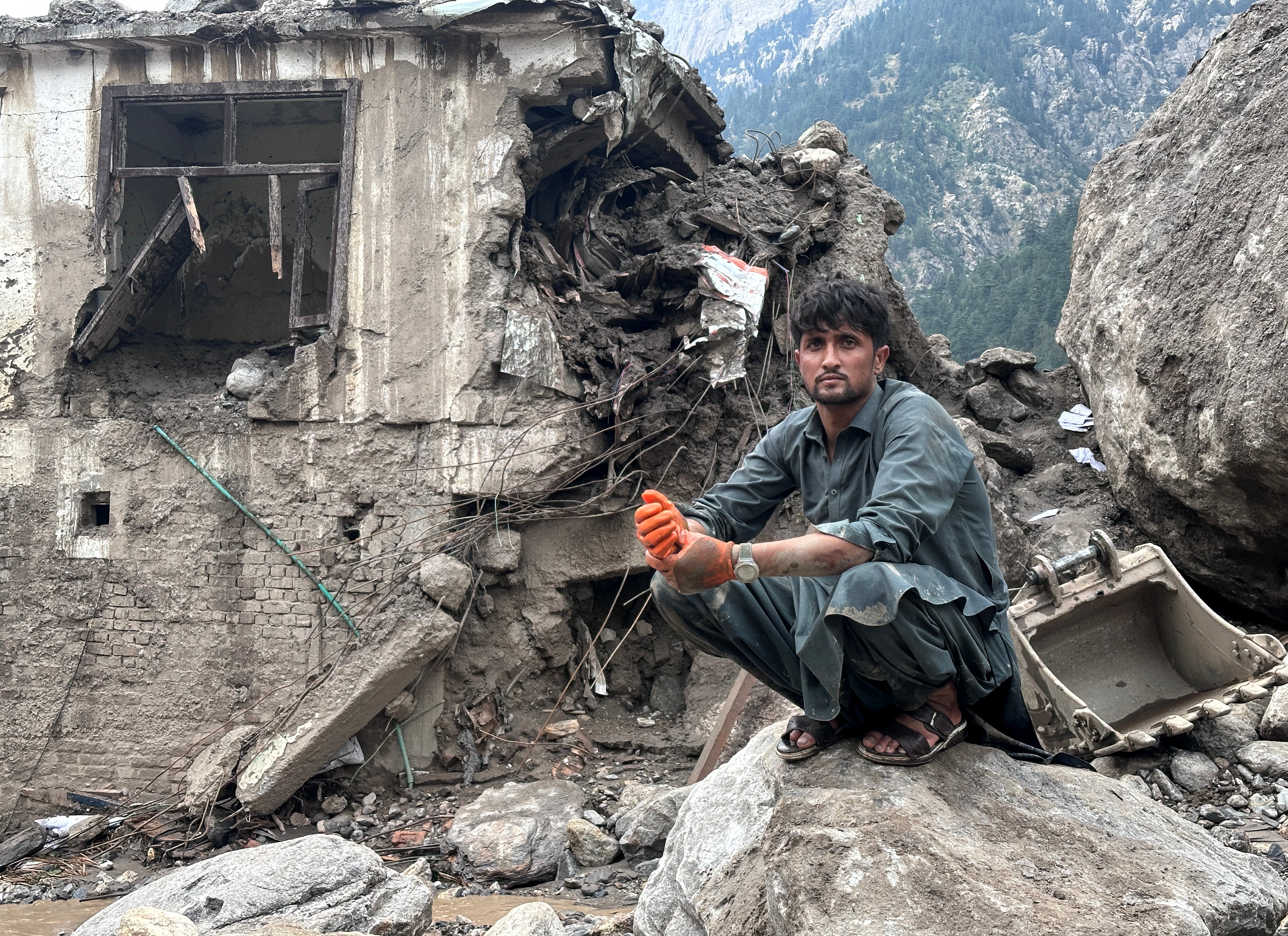 Desperate search for survivors after flash floods ‘like an earthquake' kill 23 people in Afghanistan