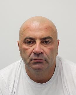 ‘Cowardly' rapist on the run after prison release error jailed in his absence