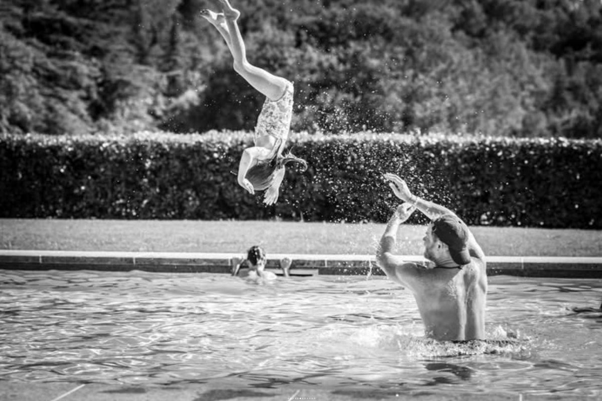 Prince Harry throws daughter Lilibet in swimming pool in newly released family holiday photos Prince Harry throws daughter Lilibet in swimming pool in newly released family holiday photos