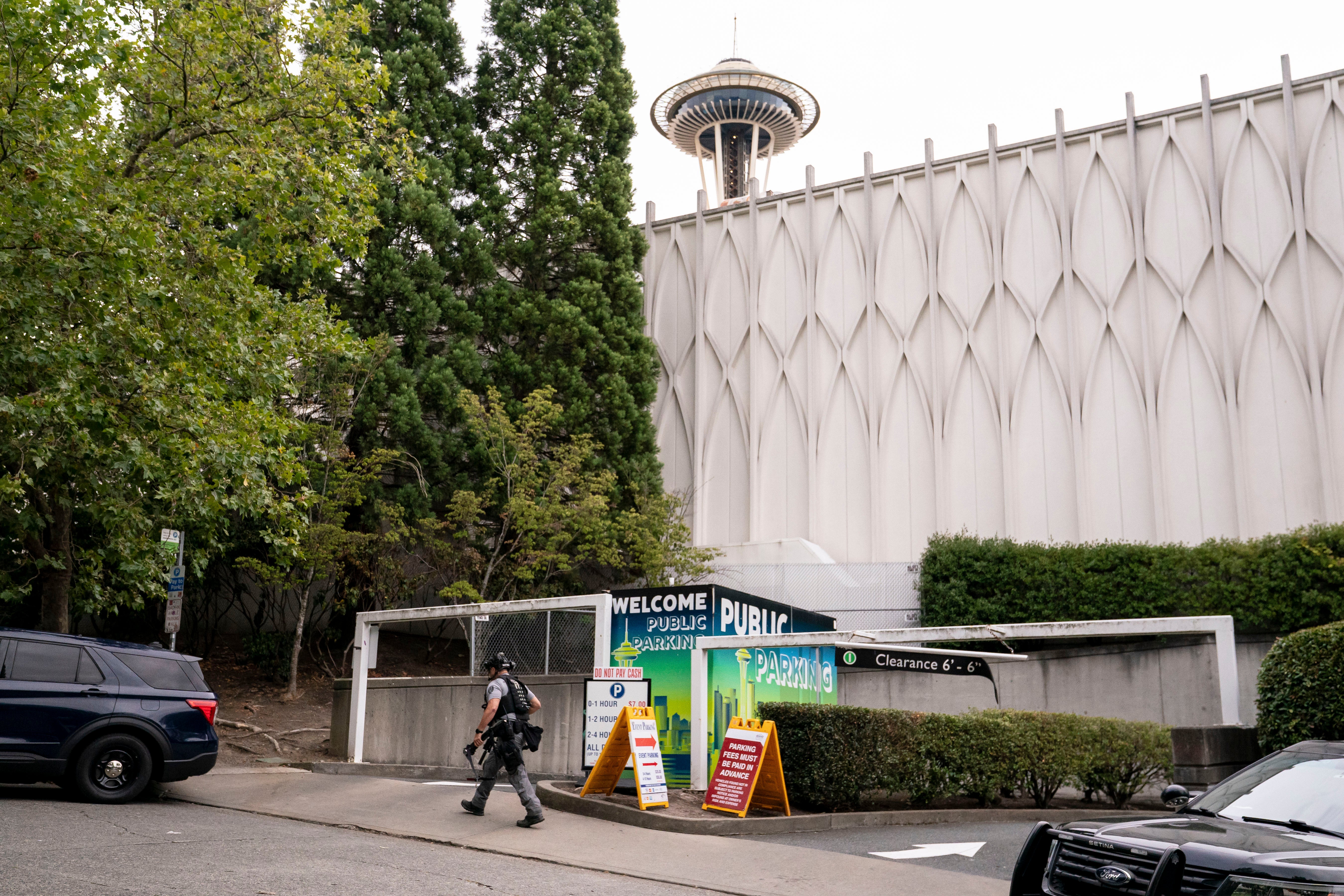 A constabulary serviceman walks connected patrol aft a wide shooting astatine nan Bite of Seattle nutrient show connected 26 July 2026 successful Seattle, Washington