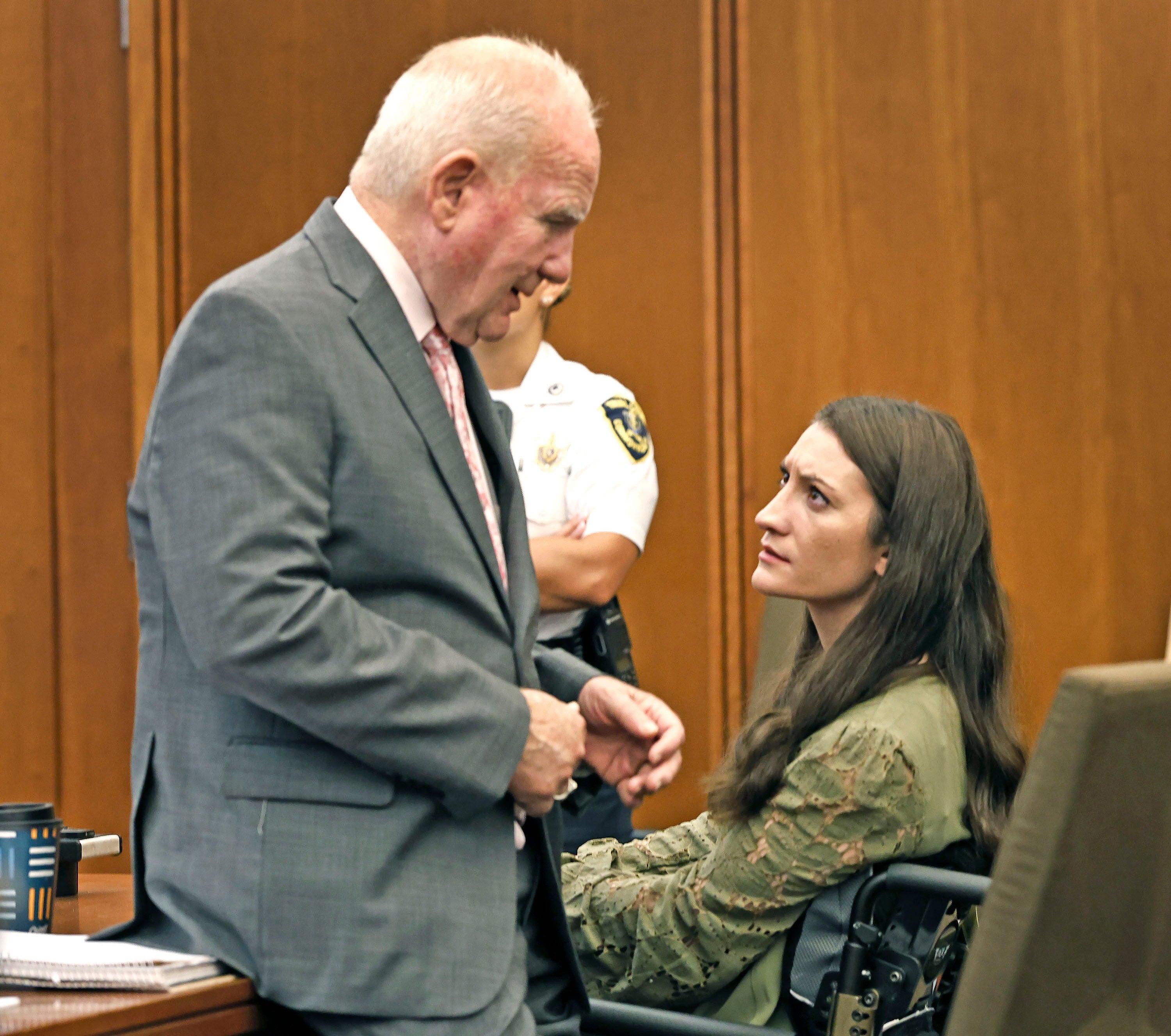 Defense lawyer Kevin Reddington stays astatine nan broadside of his customer Lindsay Clancy