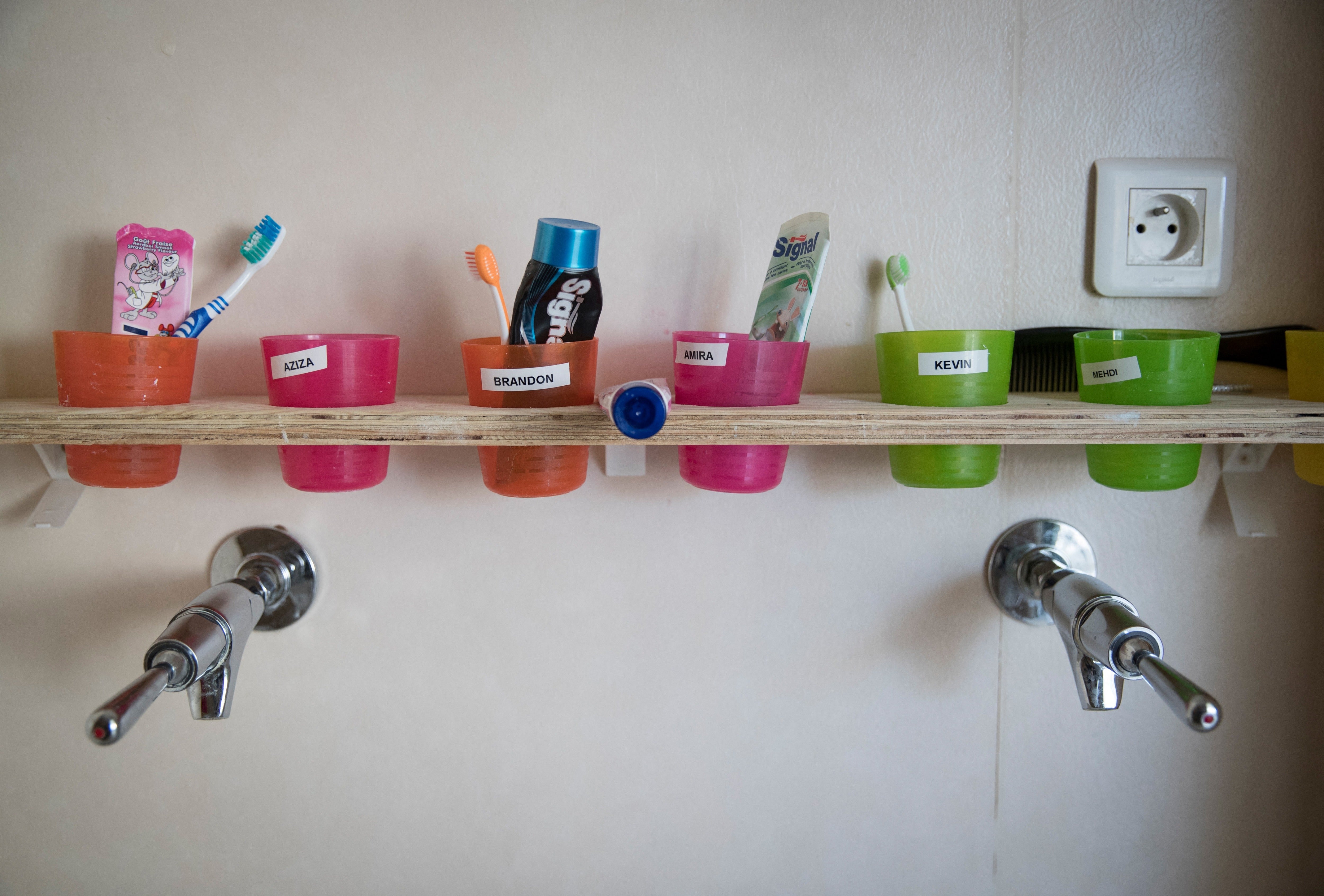 Toothbrush holders look harmless from the outside. But the insides can harbor tons of germs