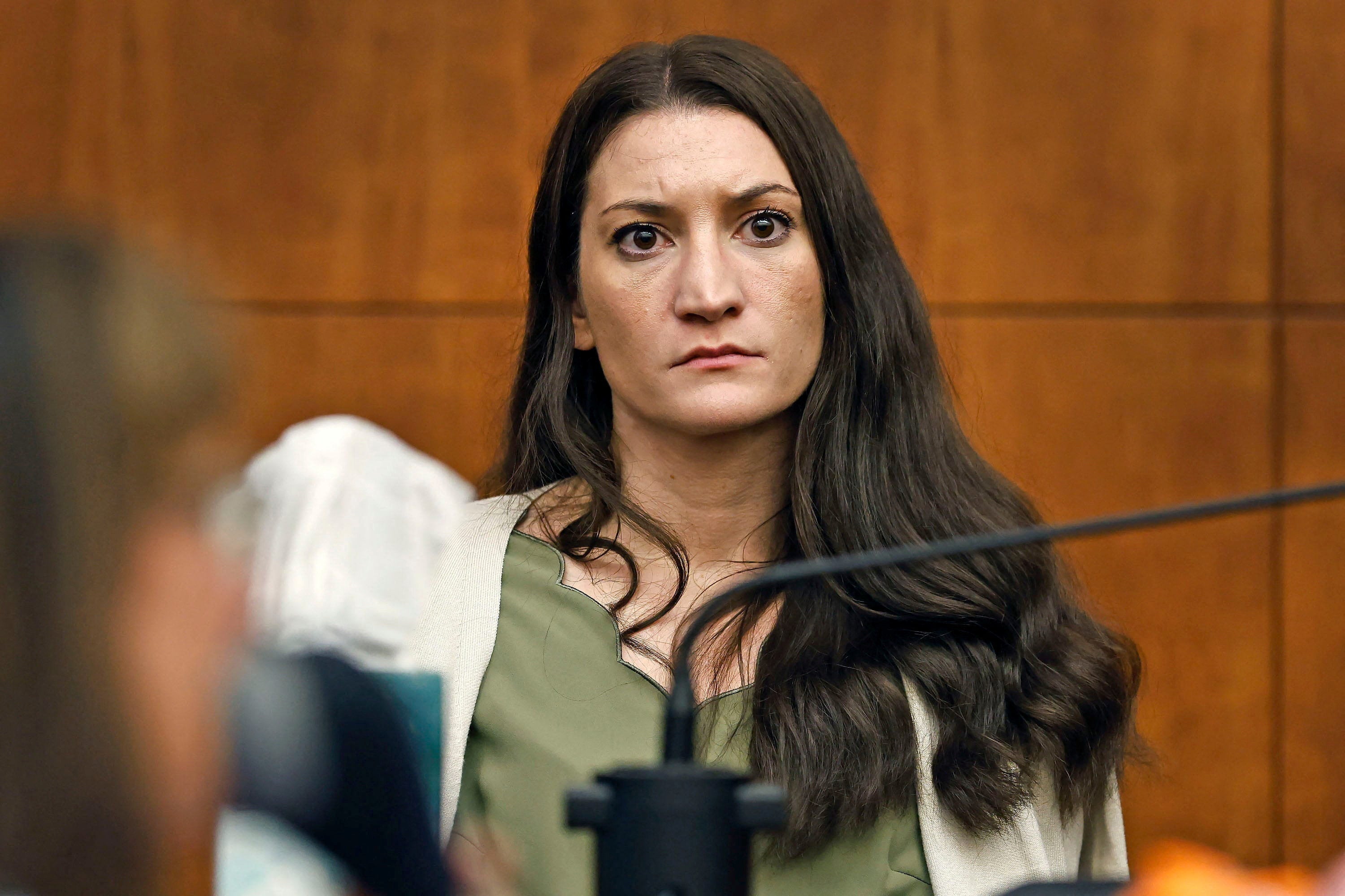 Lindsay Clancy waits for Judge William Sullivan to call a prospective jury member into court on day three of jury selection in her triple murder trial in Plymouth Superior Court in Plymouth, Massachusetts, July 22