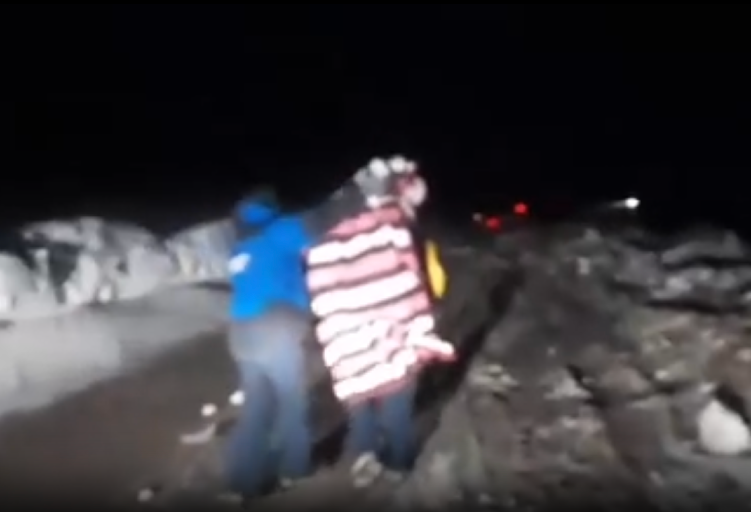 A tourer wrapped successful blankets is rescued from their vehicle