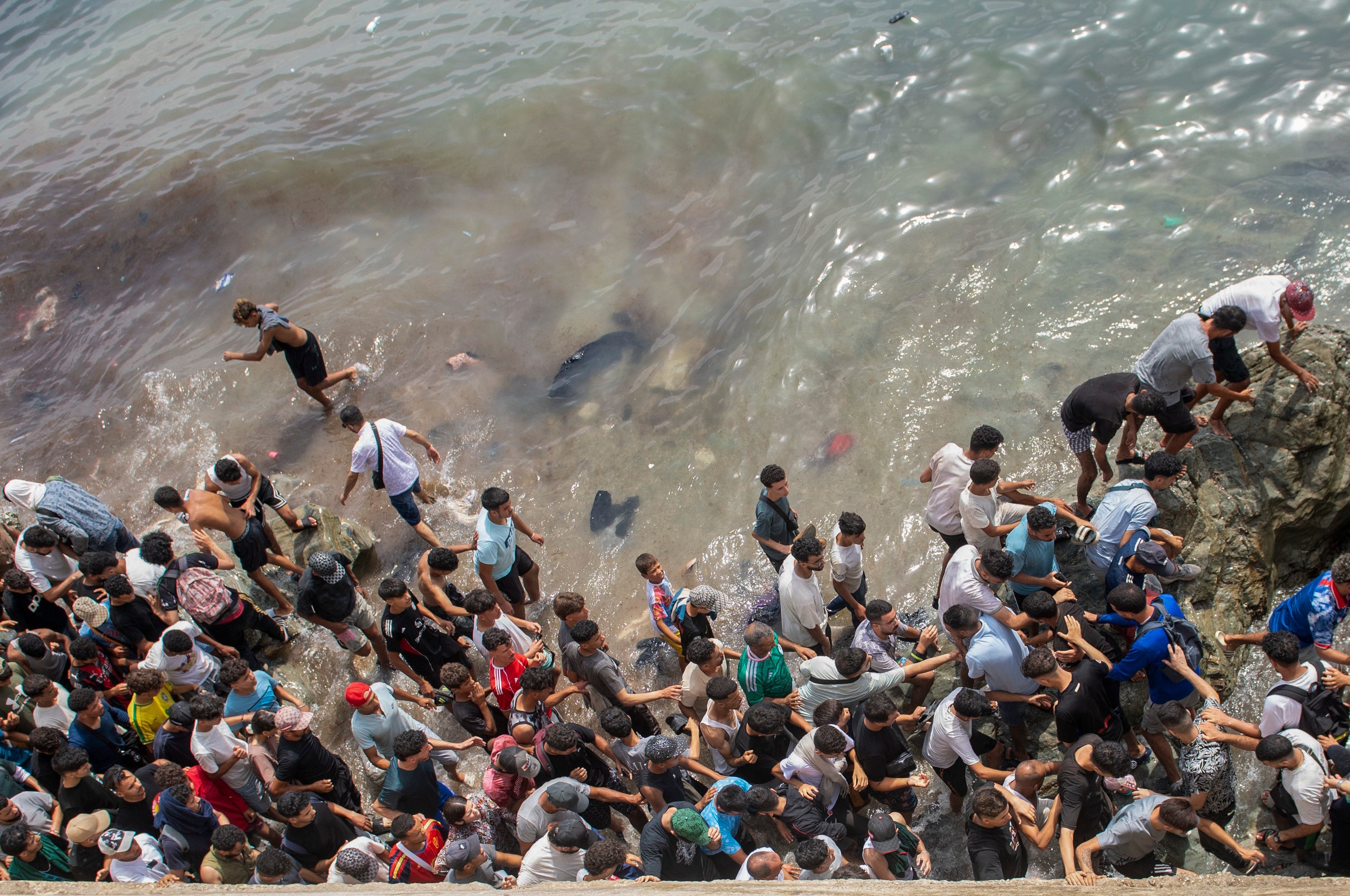 The vast majority of migrants have now returned to Morocco, Spain said