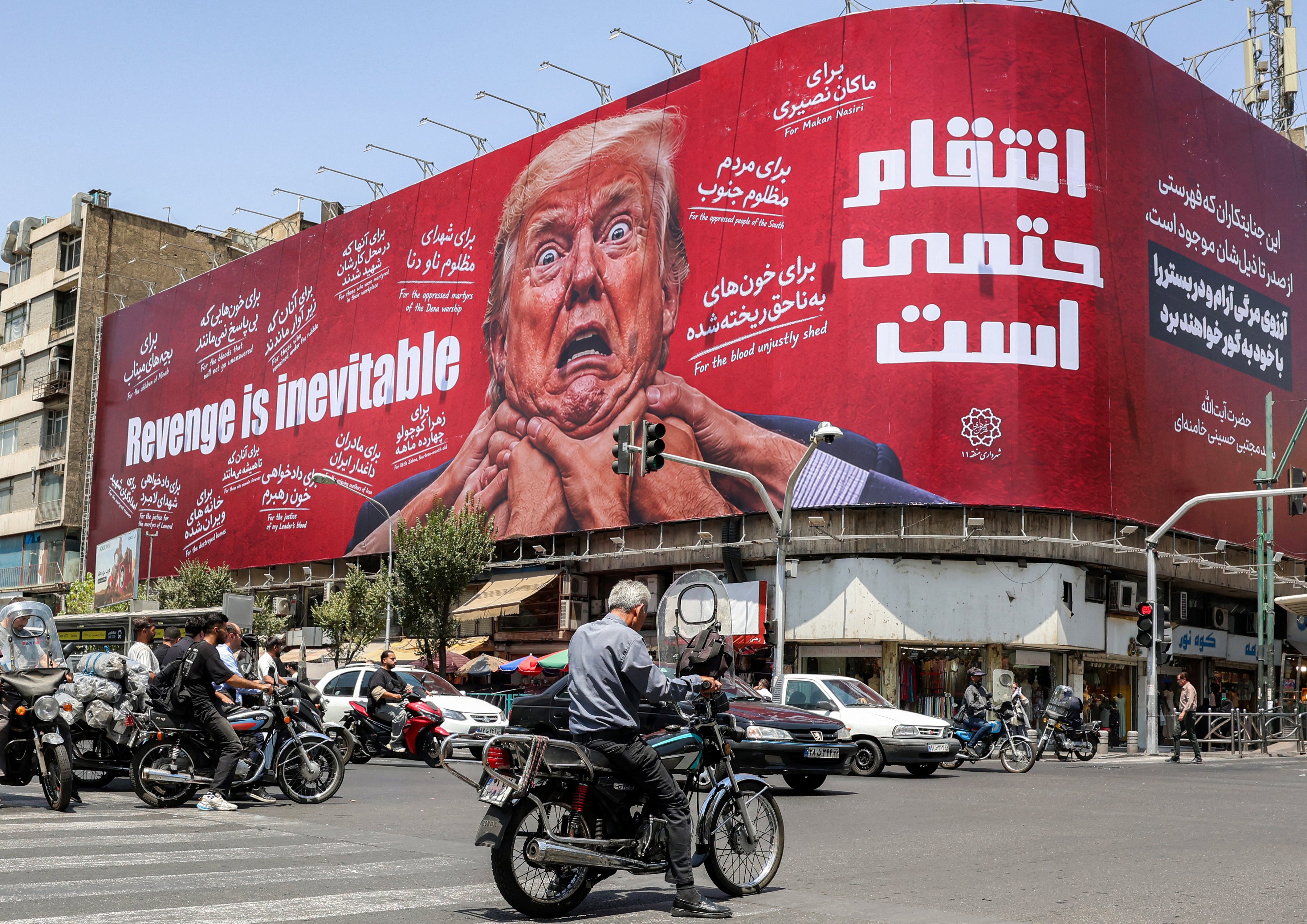 Motorists successful Tehran thrust past a ample advertisement pledging revenge against Trump connected July 27