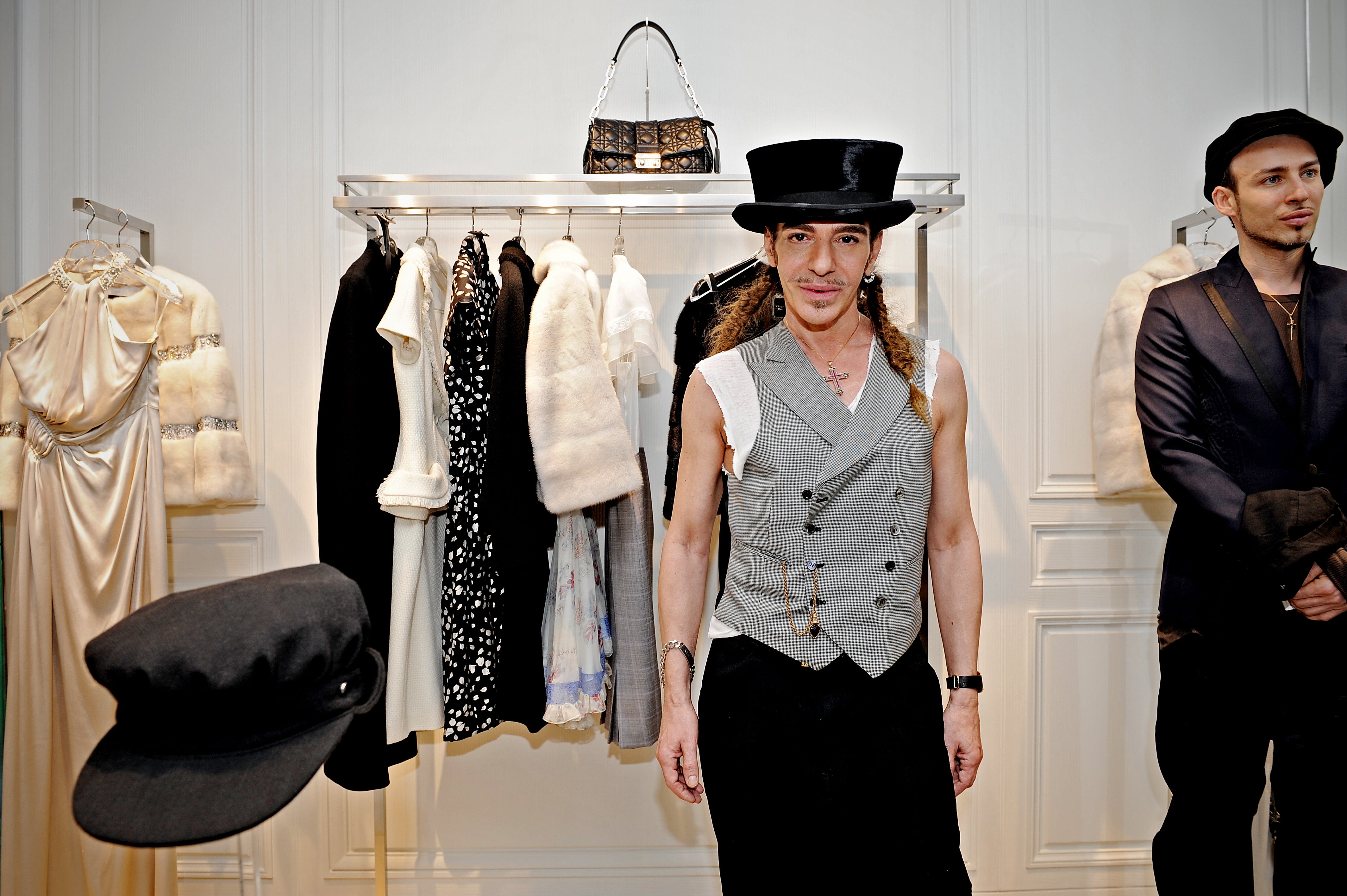 John Galliano, pictured here in a Dior store in Shanghai in 2010, was briefly exiled from the fashion world after his 2011 antisemitic comments surfaced