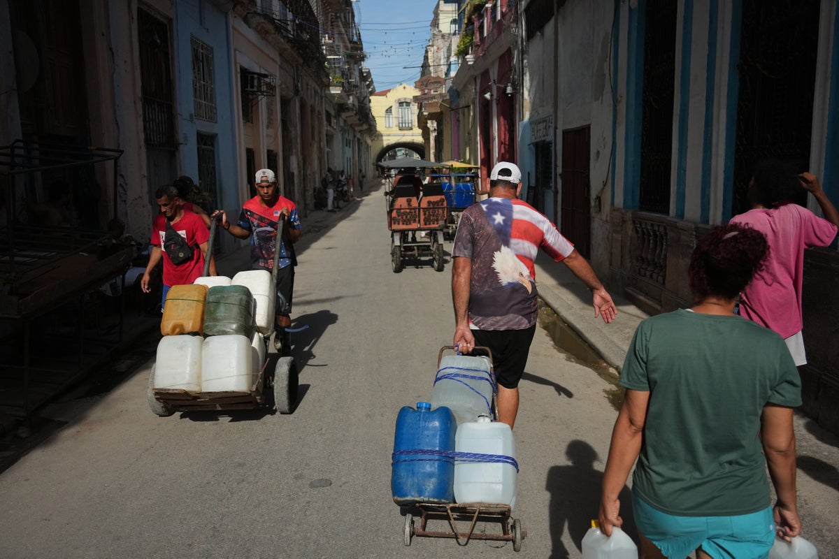 Life in Cuba revolves around small bursts of electricity as blackouts last for days