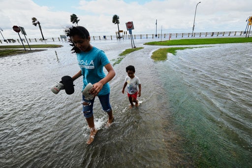 Kids play successful nan floodwaters from Tropical Storm Bertha successful New Orleans, Louisiana, past month. The large wind was 1 of 2 named storms successful nan Atlantic this year