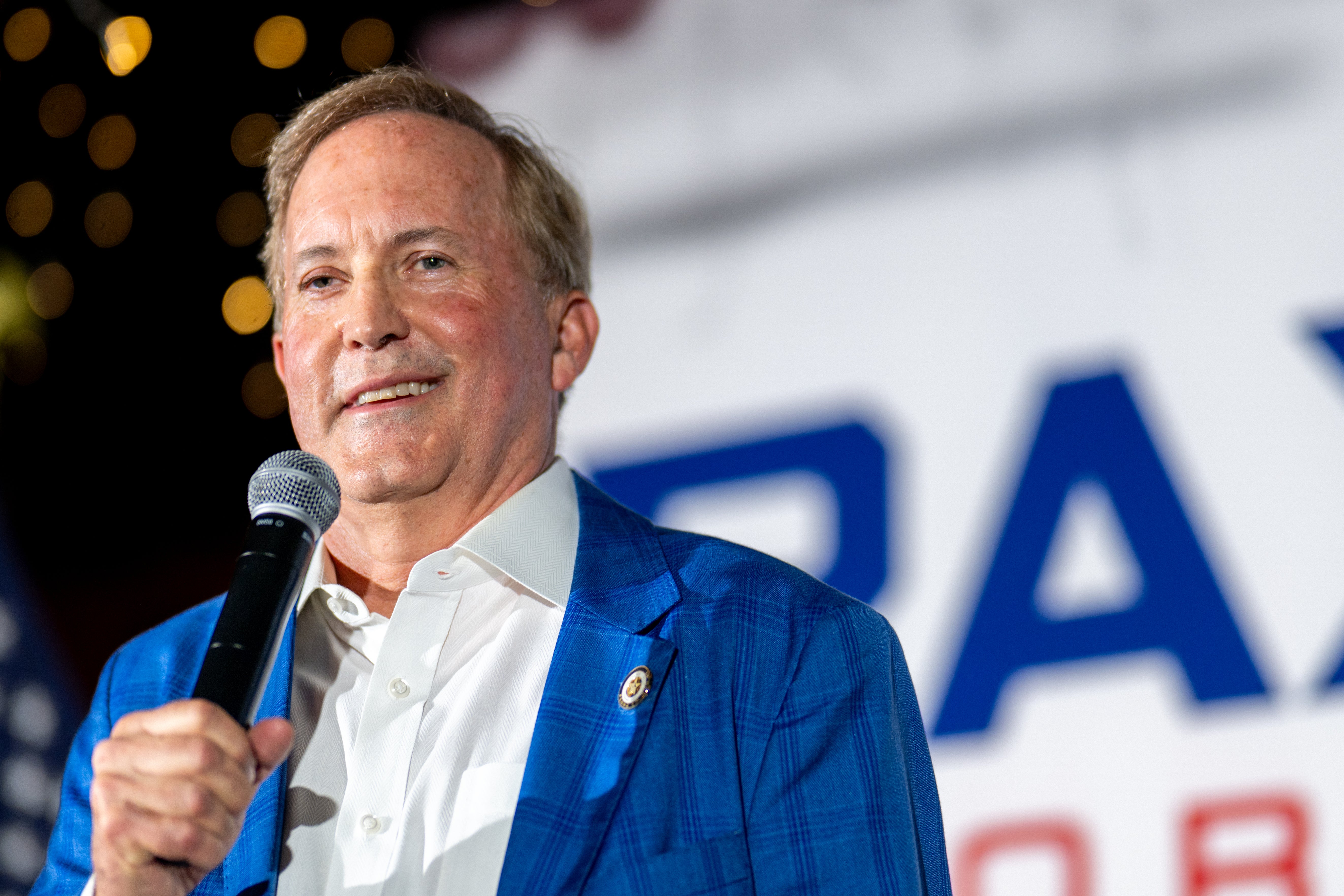 At a run arena complete nan weekend, Ken Paxton was heckled by members of nan crowd who accused him of protecting pedophiles and of cheating connected his wife