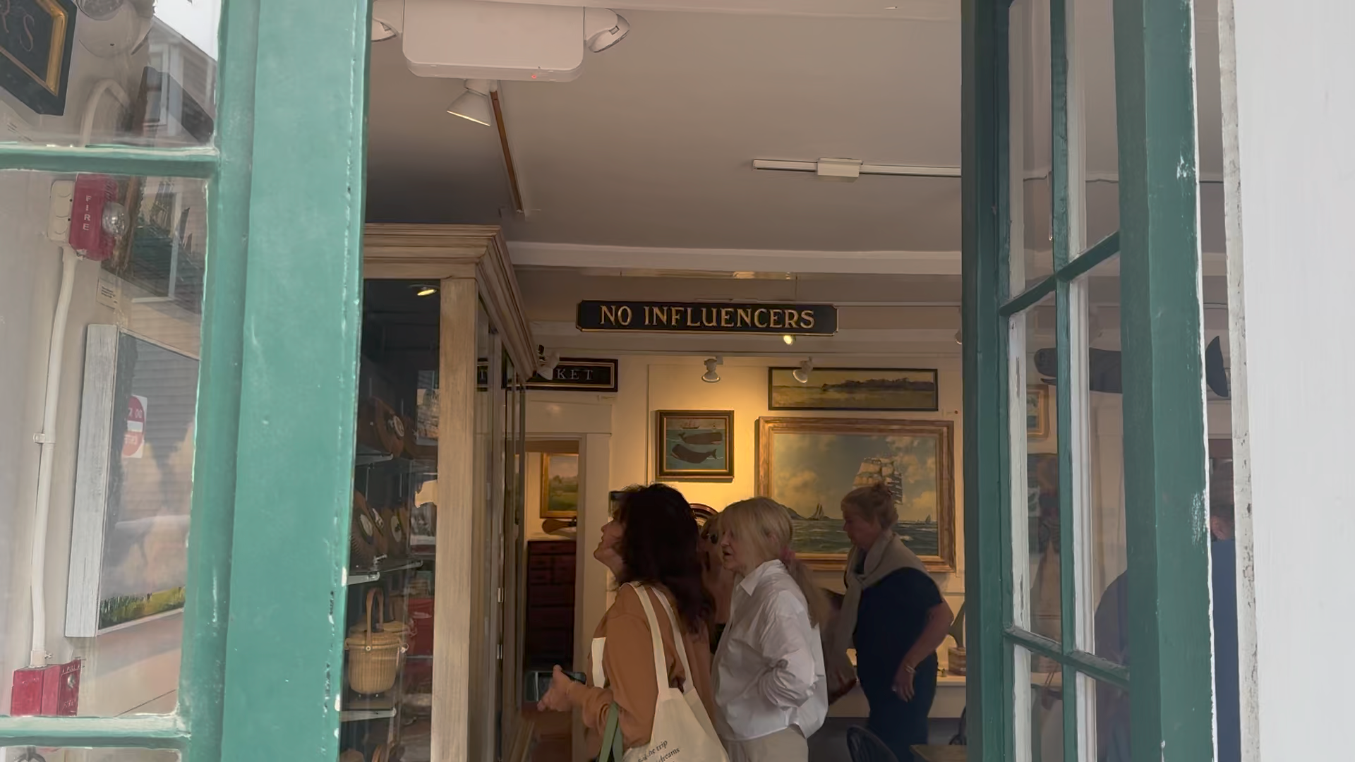 The 'No Influencers' motion connected show successful John Sylvia’s Nantucket shop Four Winds Craft Guild group disconnected a firestorm of statement connected nan usually staid land disconnected Cape Cod