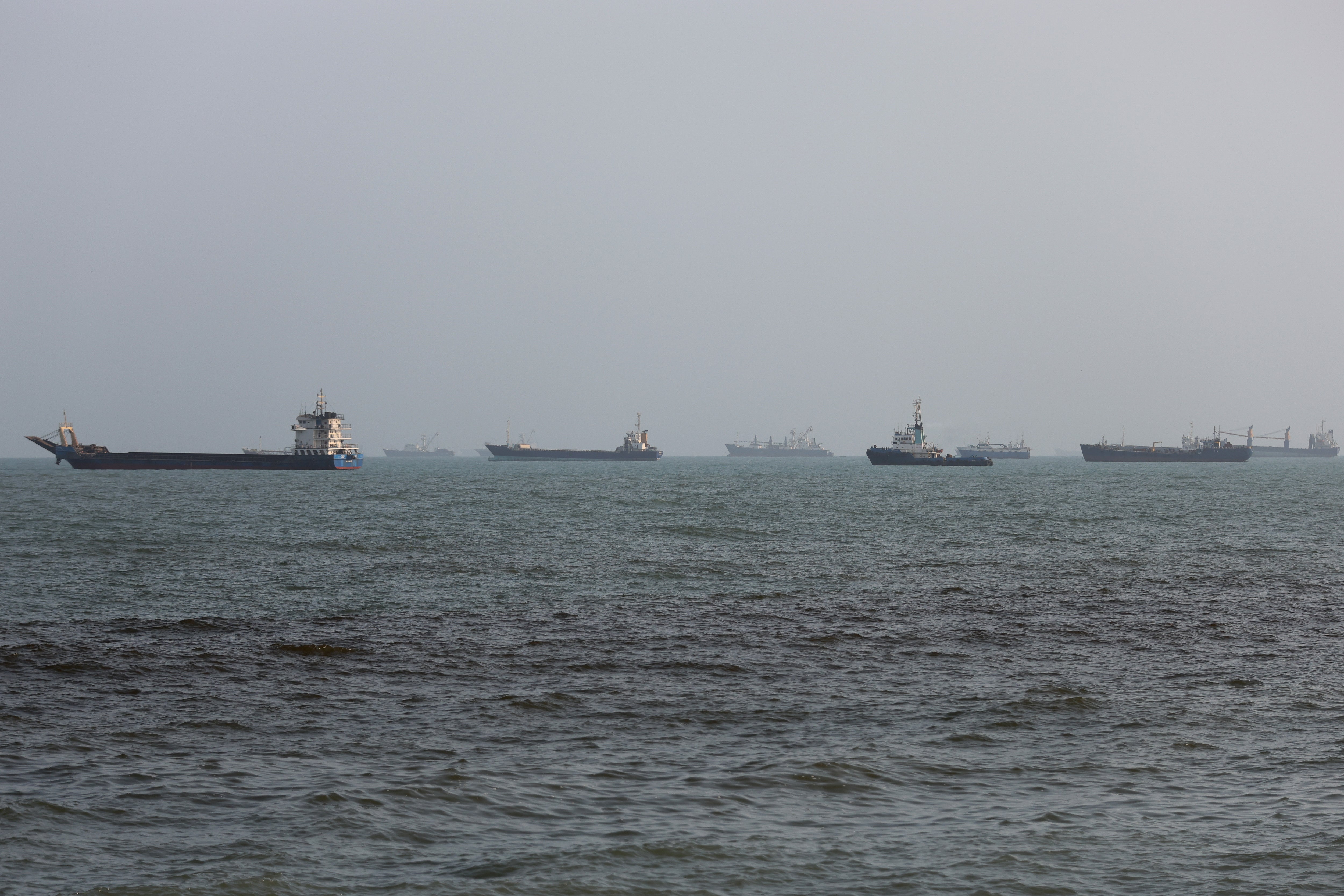 Ships are anchored successful nan Strait of Hormuz arsenic it remains closed owed to Trump’s warfare against Iran