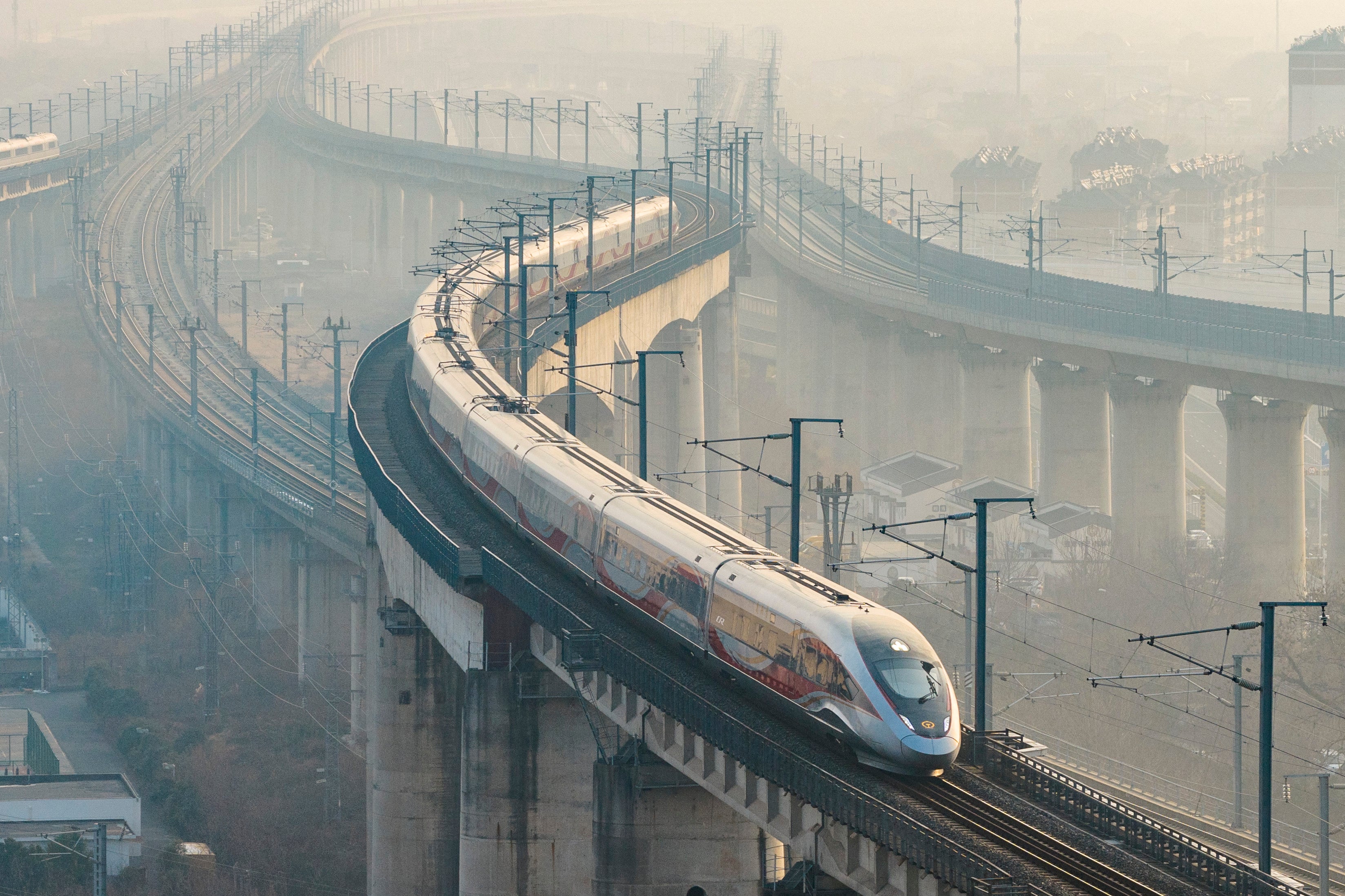 A high-speed train runs on elevated tracks in Nanjing, Jiangsu province, China on 25 January 2026