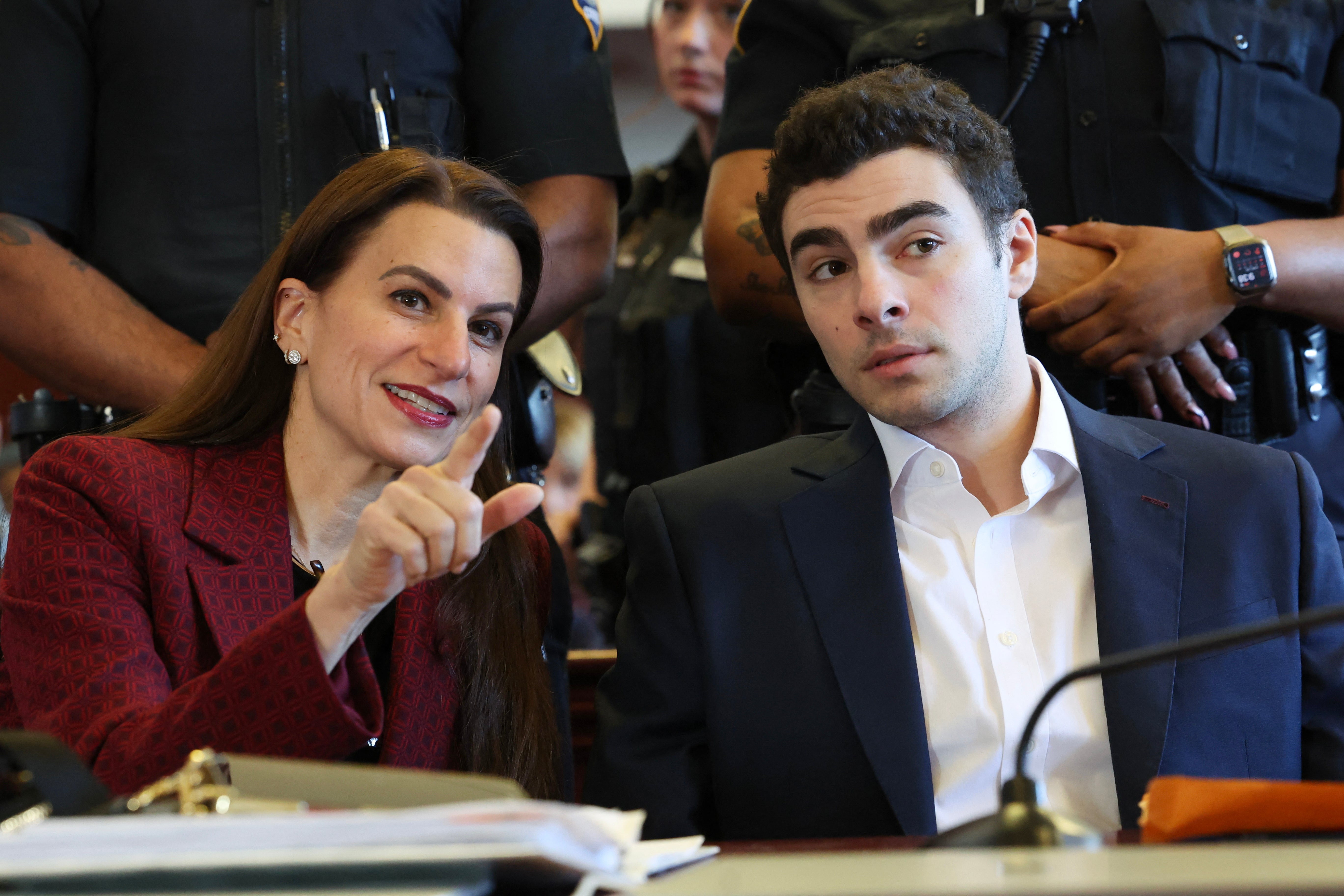 Mangione’s defense team, led by Karen Agnifilo (pictured left), has been arguing that charges against their client in state and federal court amount to double jeopardy