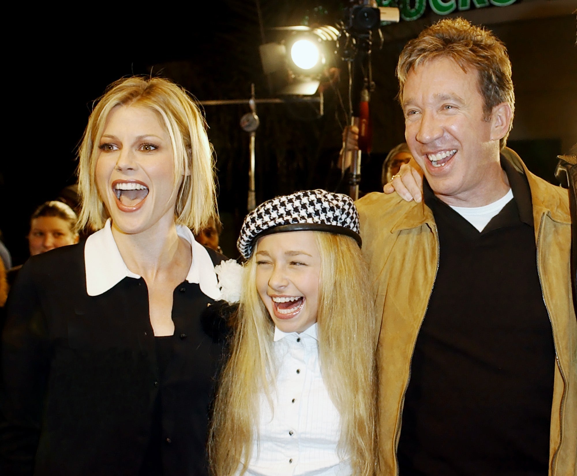 Hayden Panettiere (centre) with fellow cast members from the film ‘Joe Somebody’ Julie Bowen and Tim Allen to the film's premiere in the Westwood Village of Los Angeles in 2001