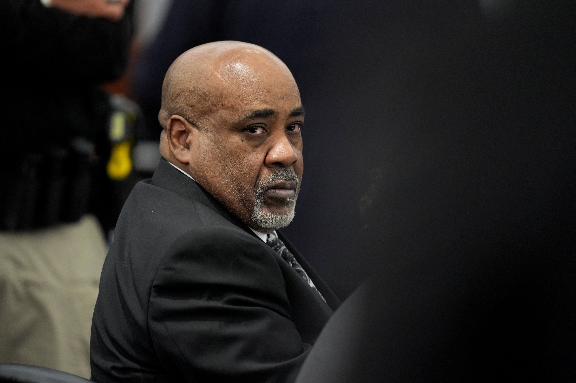 Some Tupac Shakur family members leave court as autopsy photos shown at trial