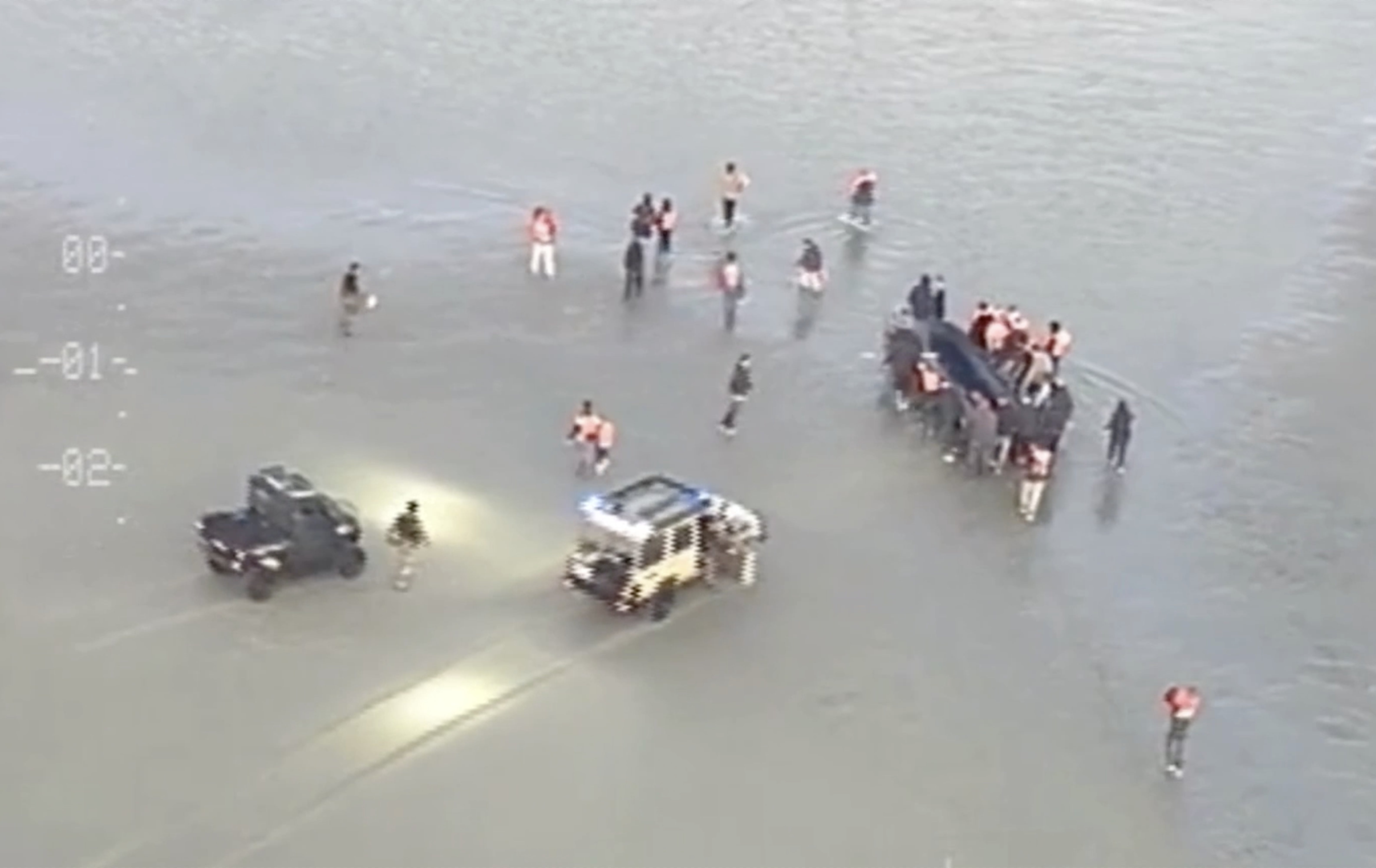 French police slash migrant boat after clash on Channel beach