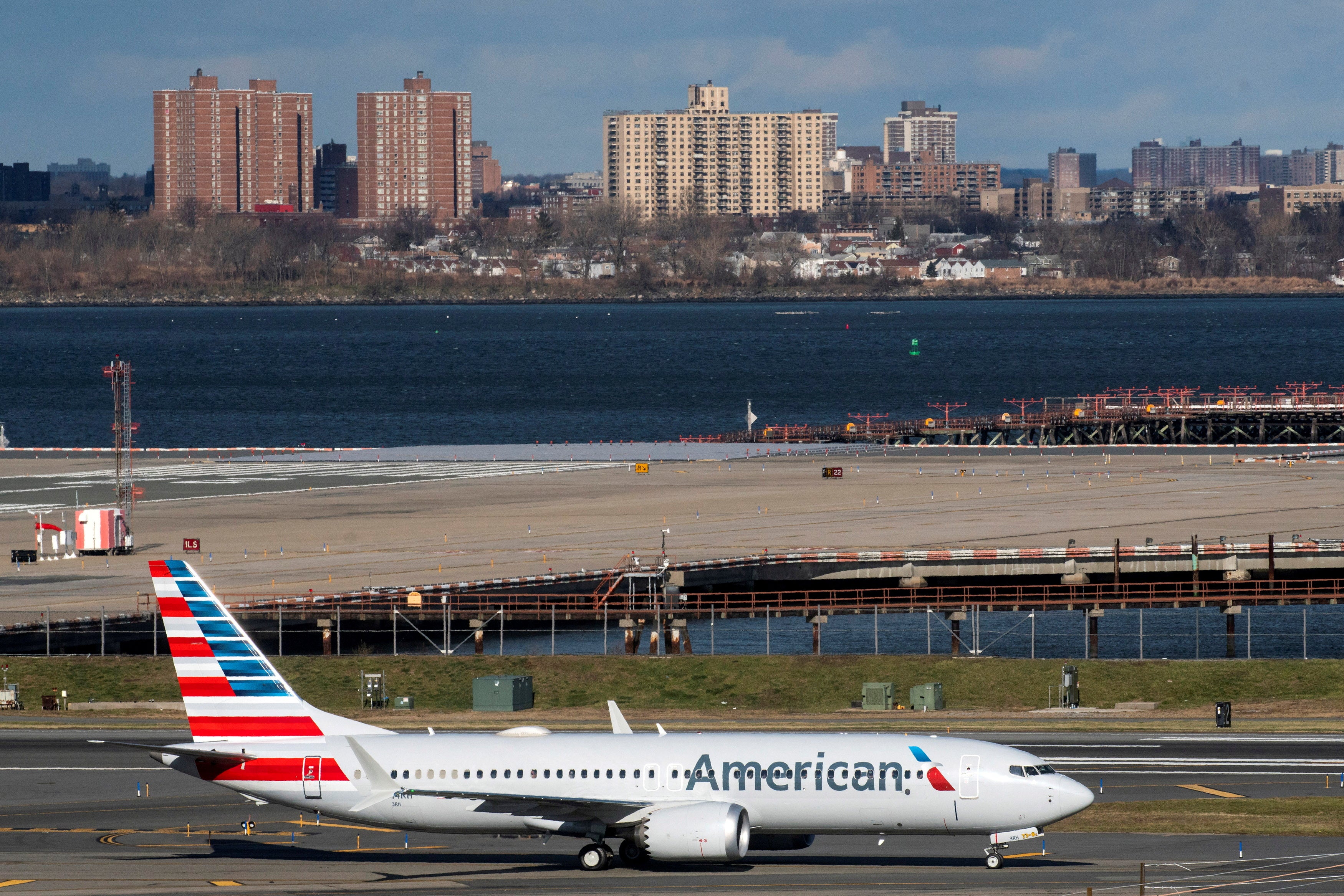 Plane passenger treated for burns after laptop catches on fire during flight