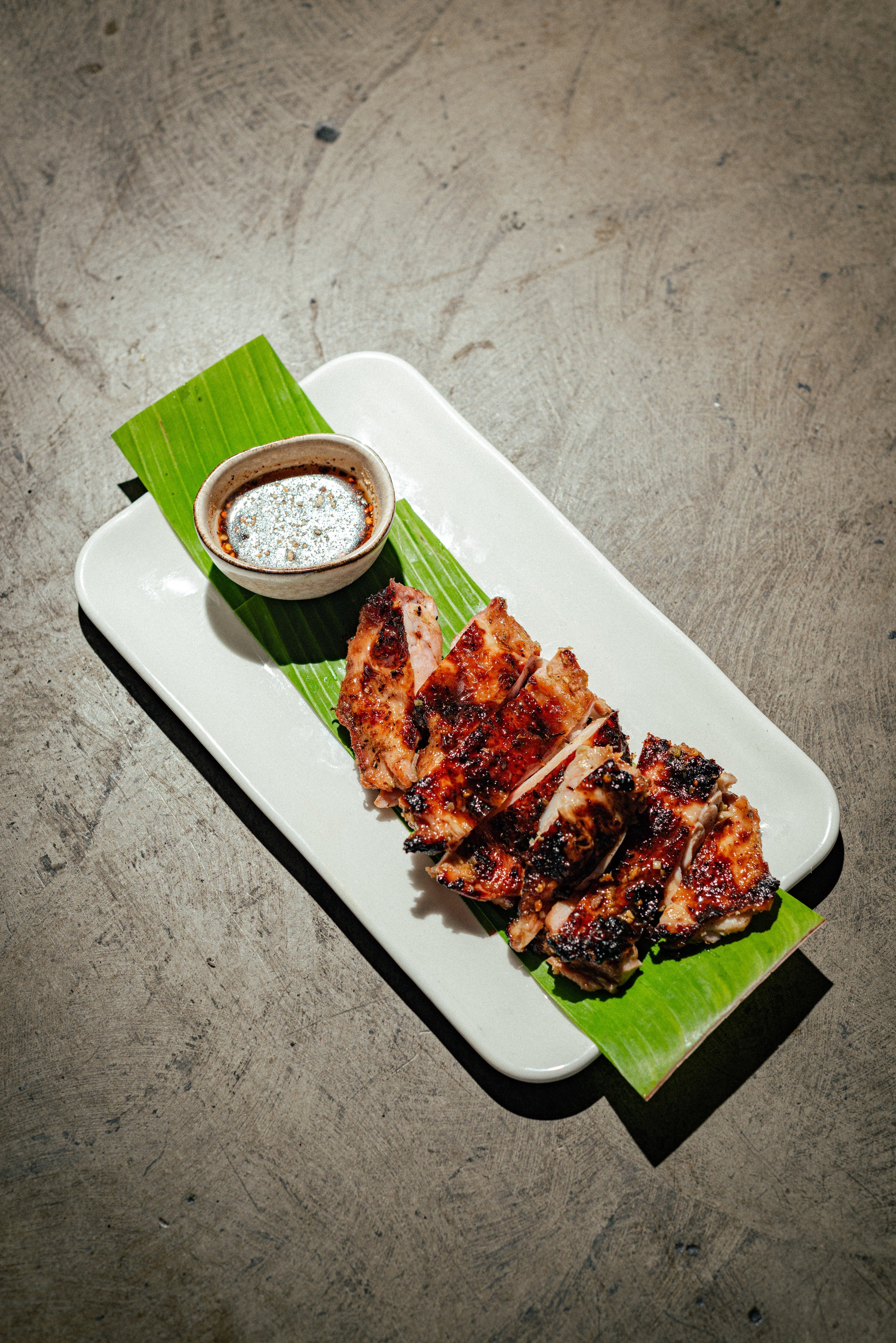 Chiang Mai-style grilled chicken, marinated with lemongrass, pineapple and fish sauce