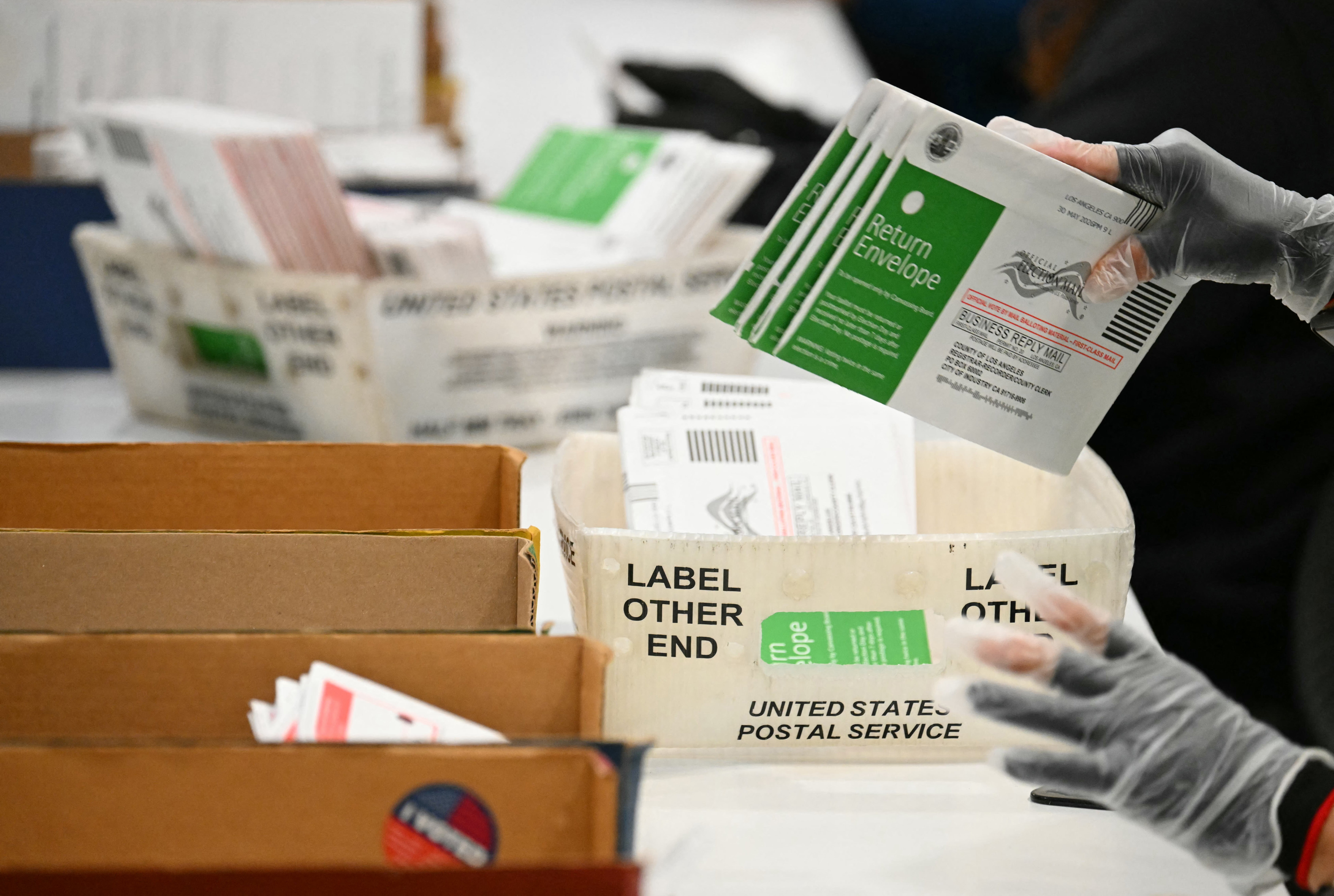 USPS could throw out millions of mail-in ballots under ‘s*** show' Trump changes, whistleblower warns