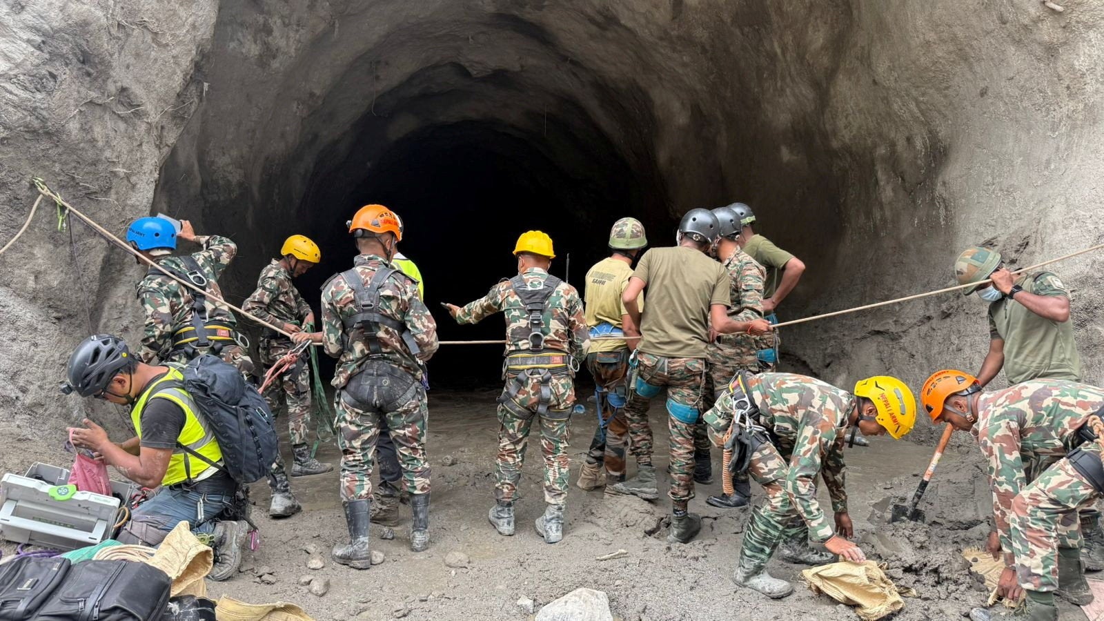 Explosions at Nepal hydropower tunnels as rescuers search for hundreds of trapped workers after deadly floods