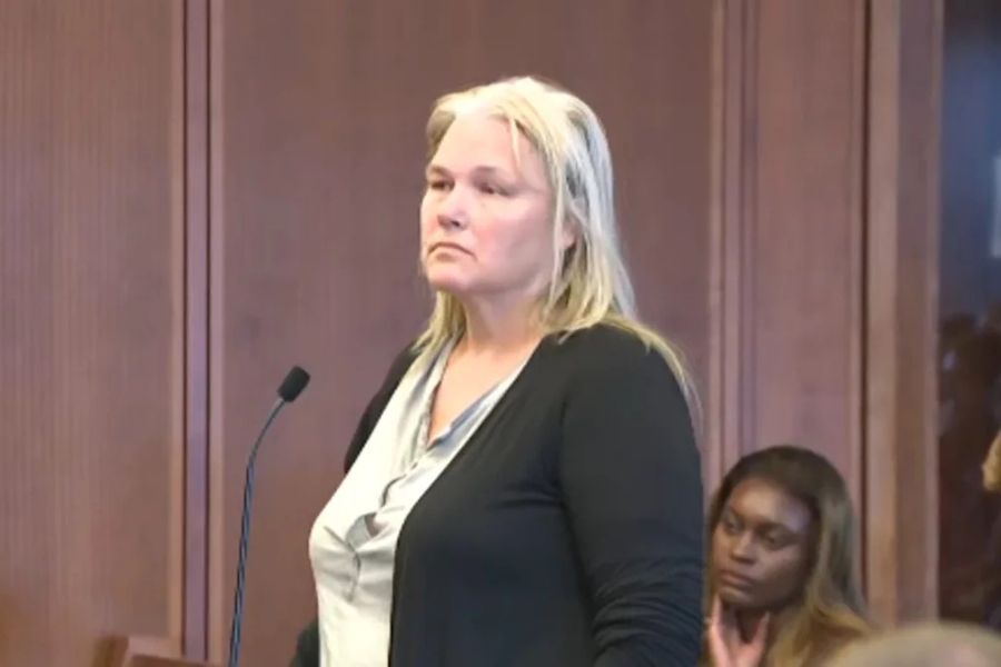 Light, pictured here in court Wednesday, was allegedly caught filming people leaving the Massachusetts courthouse Tuesday