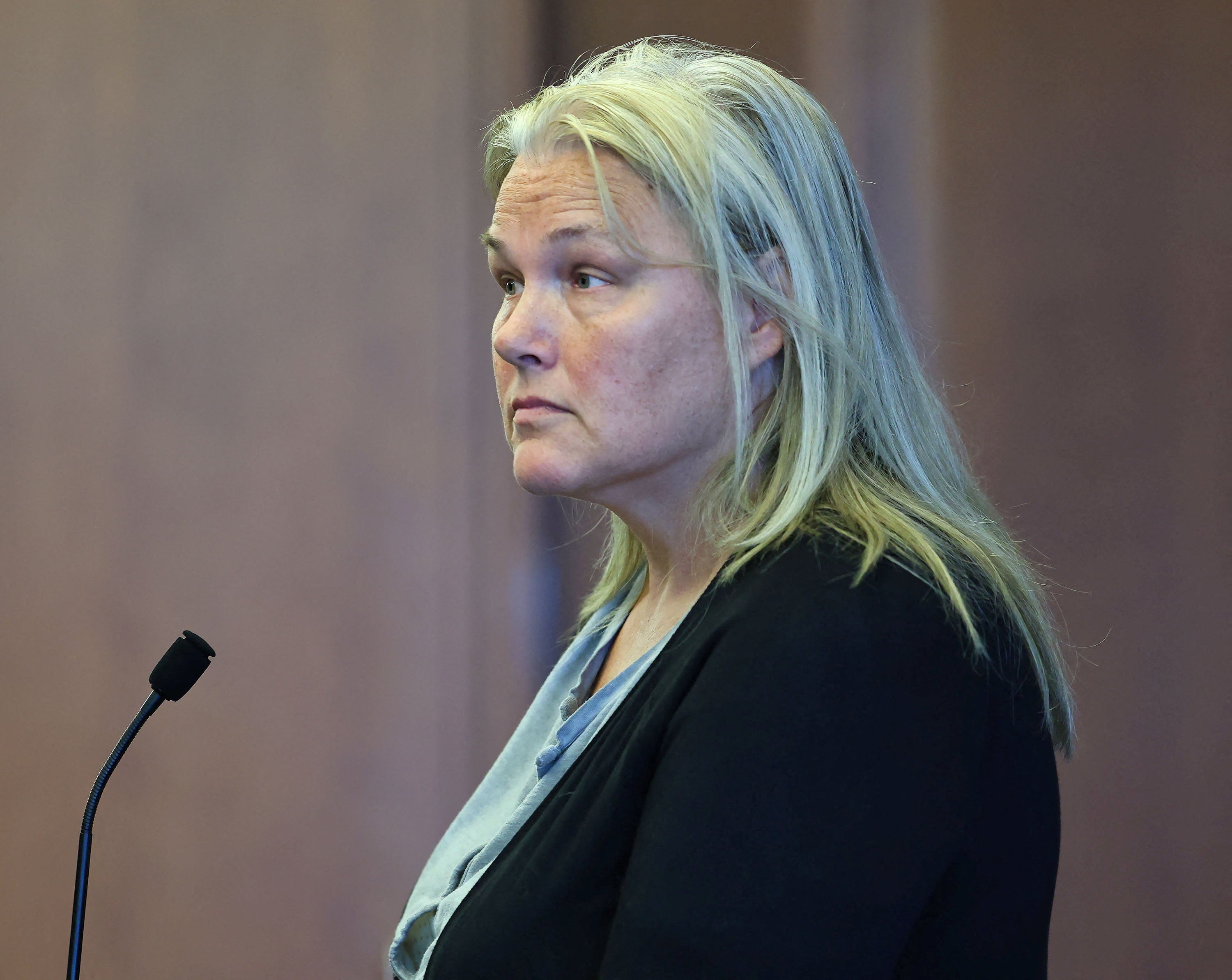 Light, pictured here in court Wednesday, was allegedly caught filming people leaving the Massachusetts courthouse Tuesday