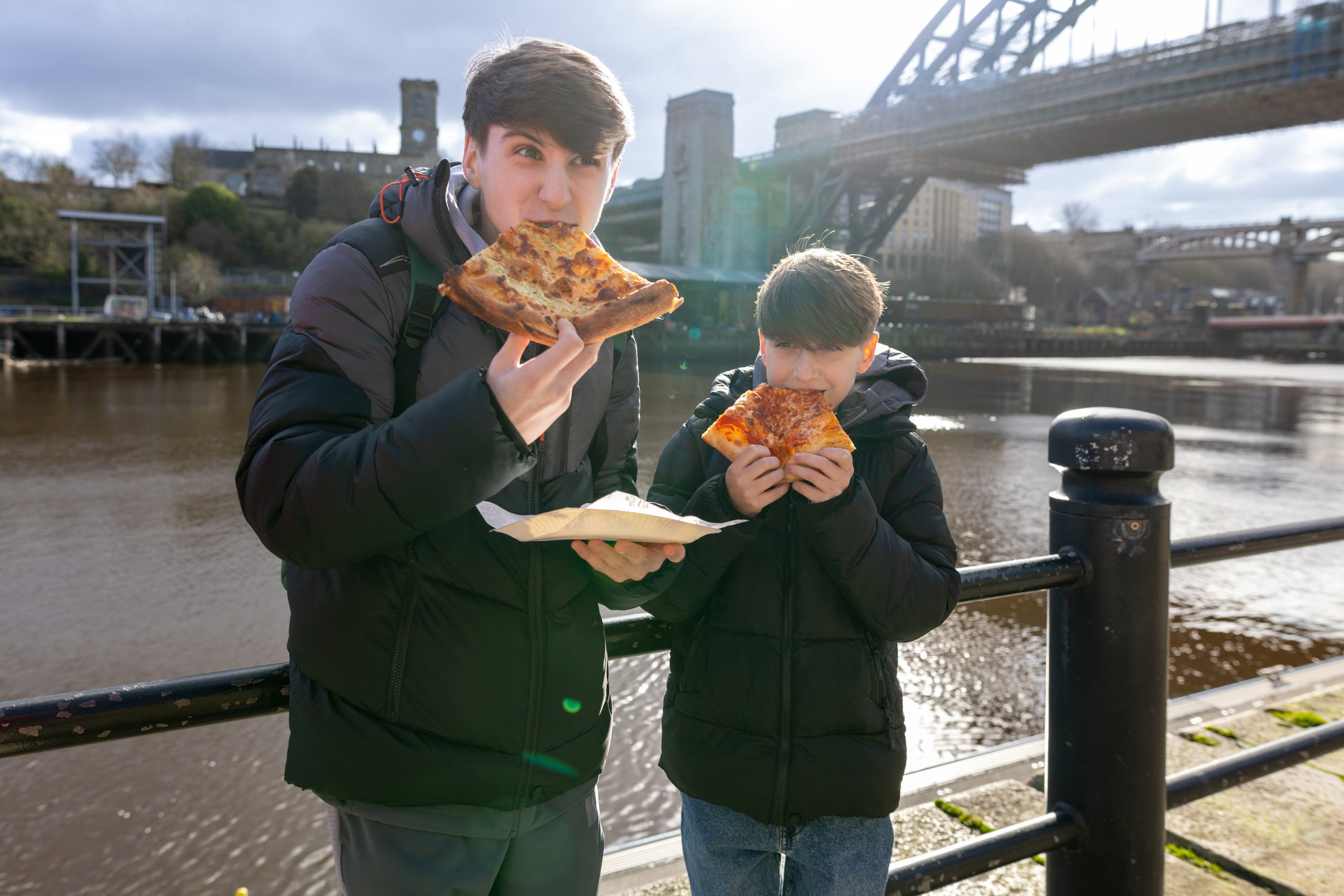 Saucy and scenic: many sliced pizza parlours lack seating – but customers are happy to chow down standing up
