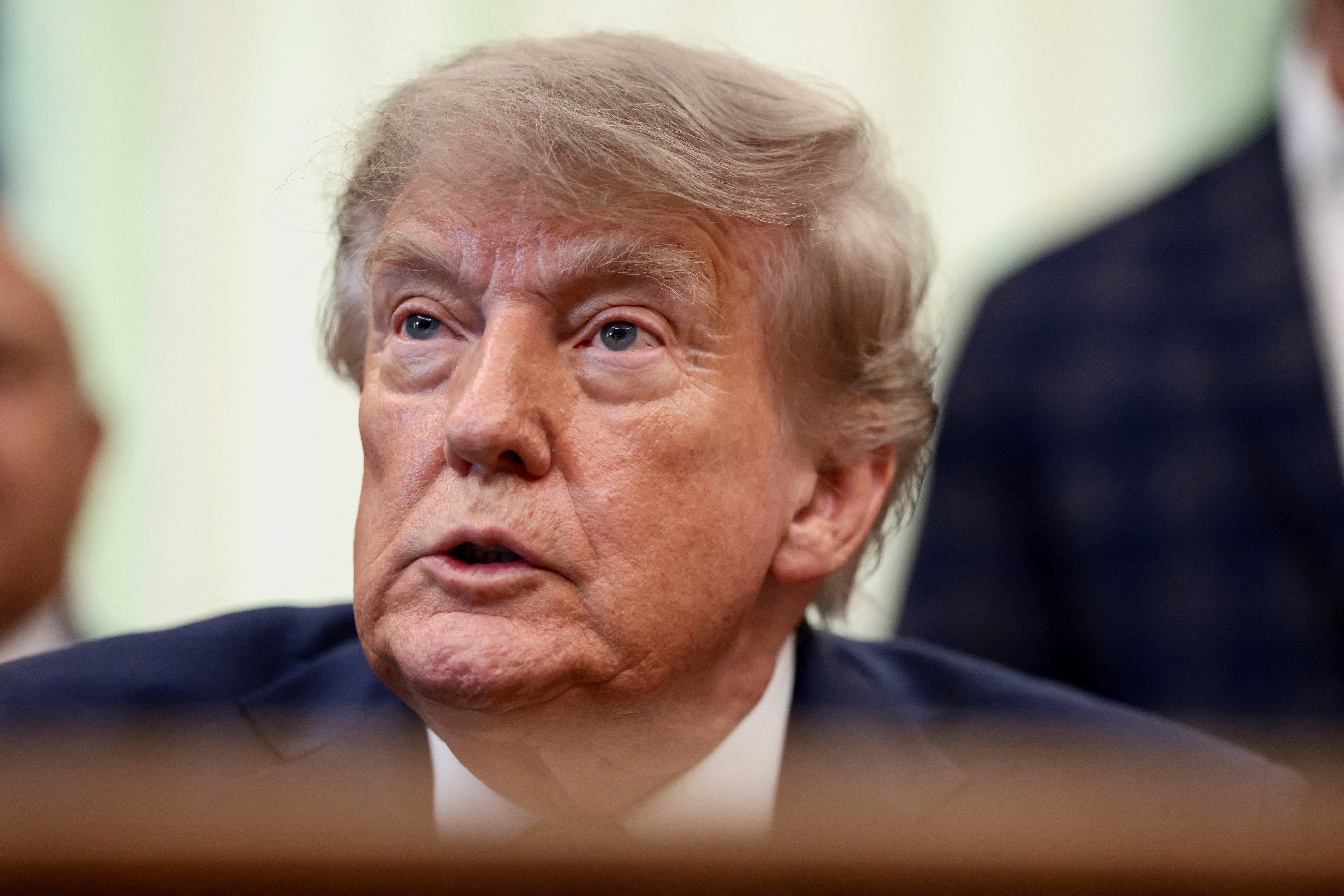 President Trump on Friday repeated his administration’s claim the Iran conflict is not a war and lashed out against a reporter for noting record-setting deployments of U.S. service members