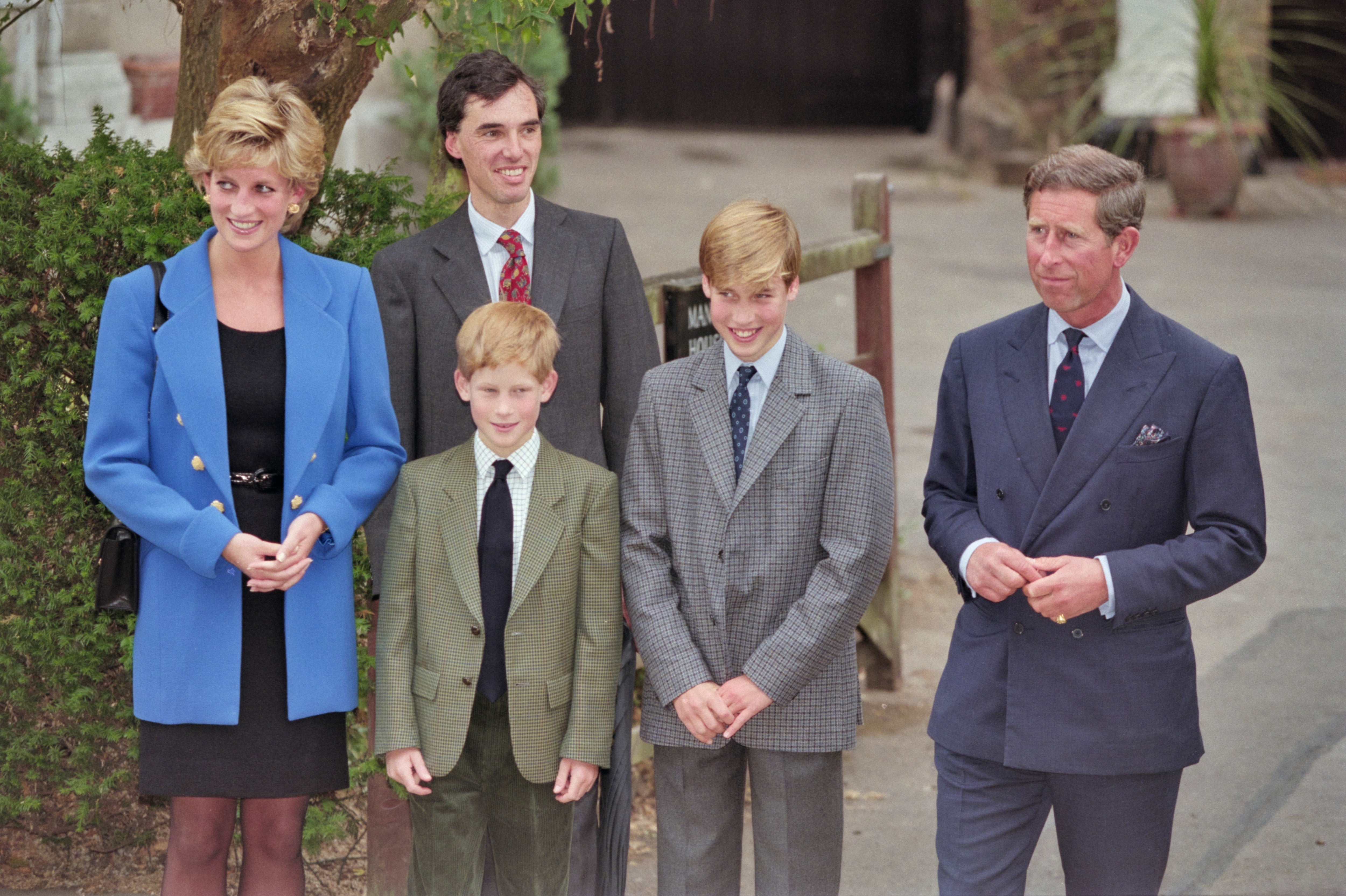 Prince William begins his time at Eton College on 6 September 1995, flanked by his mother Diana, brother Harry and father Charles