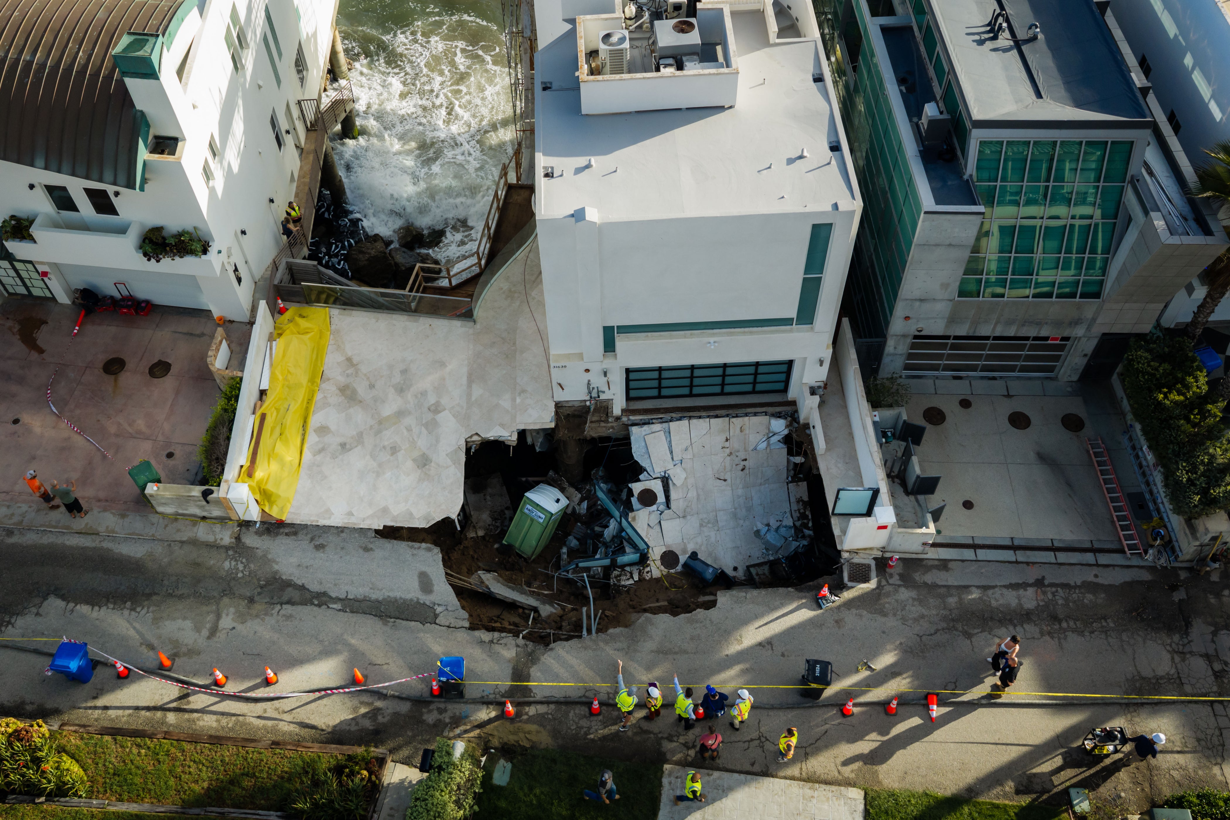 The mansion was damaged during a Los Angeles-area coastal flooding advisory over lingering effects of Marie, which had been a hurricane before turning back into a tropical storm