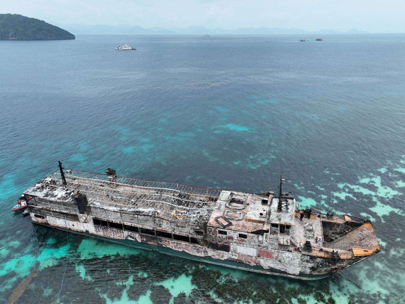 Rescuers finally able to board charred Philippines ferry 40 hours after fire broke out