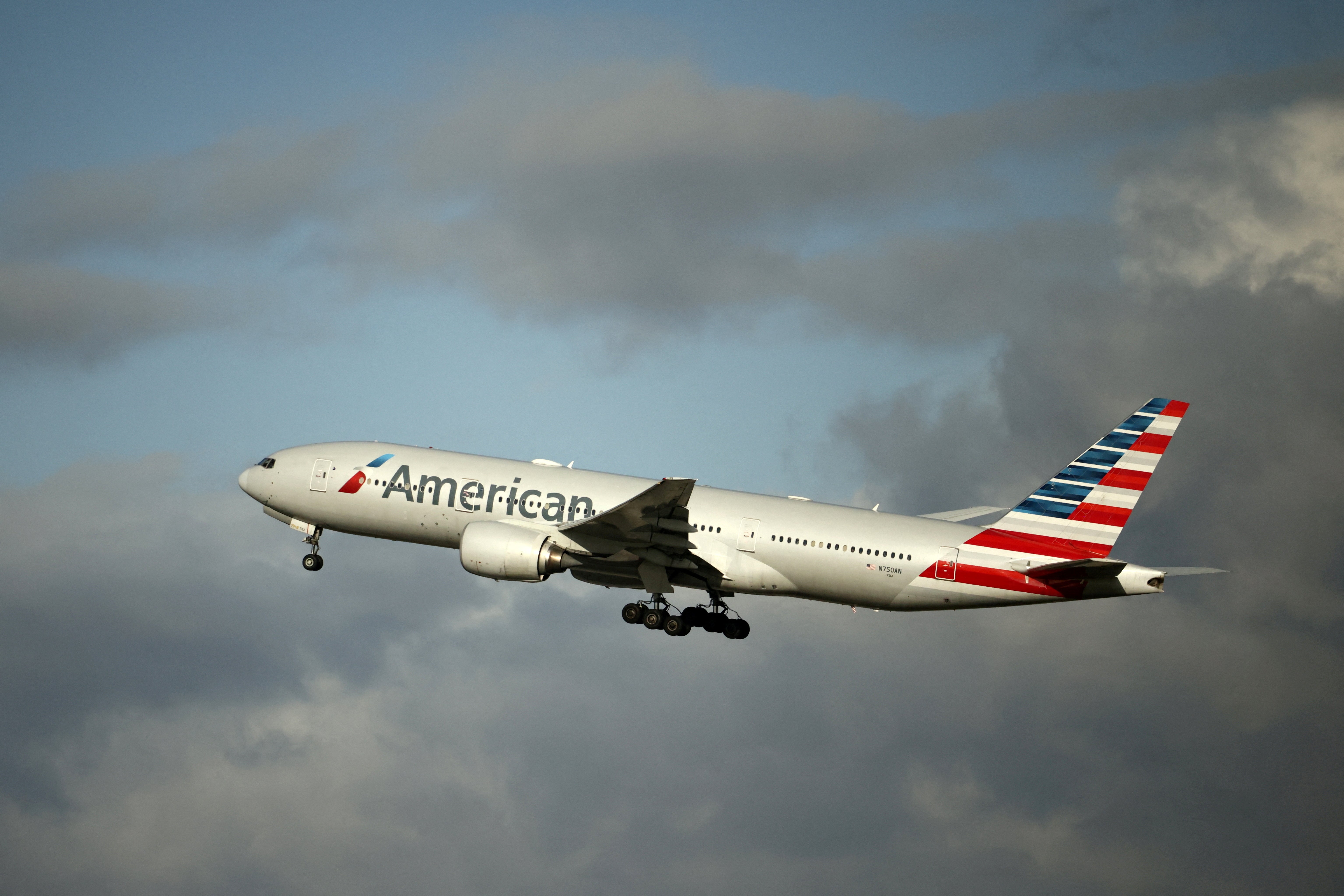 A passenger on an American Airlines flight between Baltimore and Miami was taken into custody after she allegedly stripped naked and began acting indecently in front of other travelers