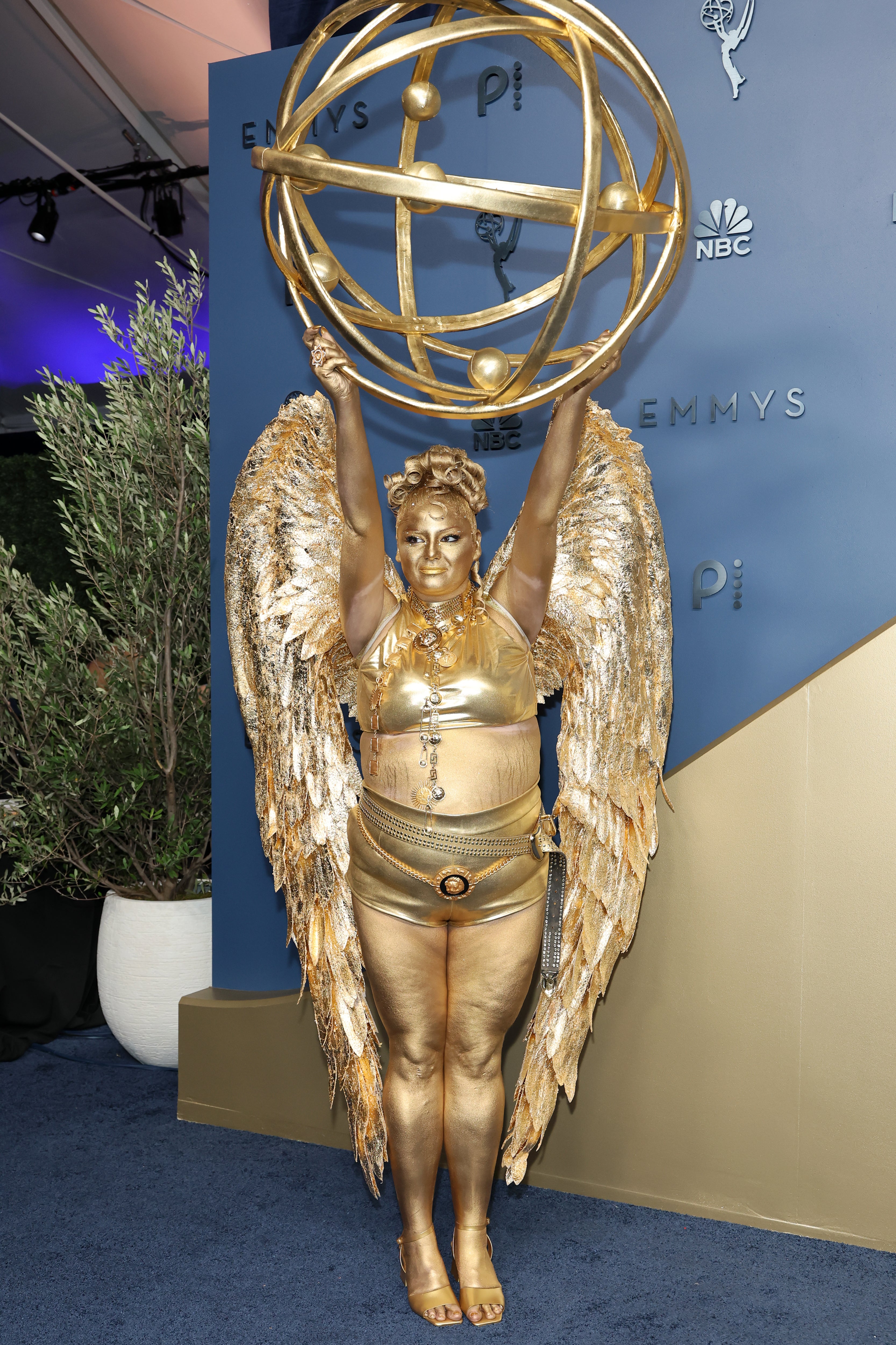 'Hacks' star Meg Stalter dressed for the Emmys as ... an Emmy. Complete with gold face paint. Wow