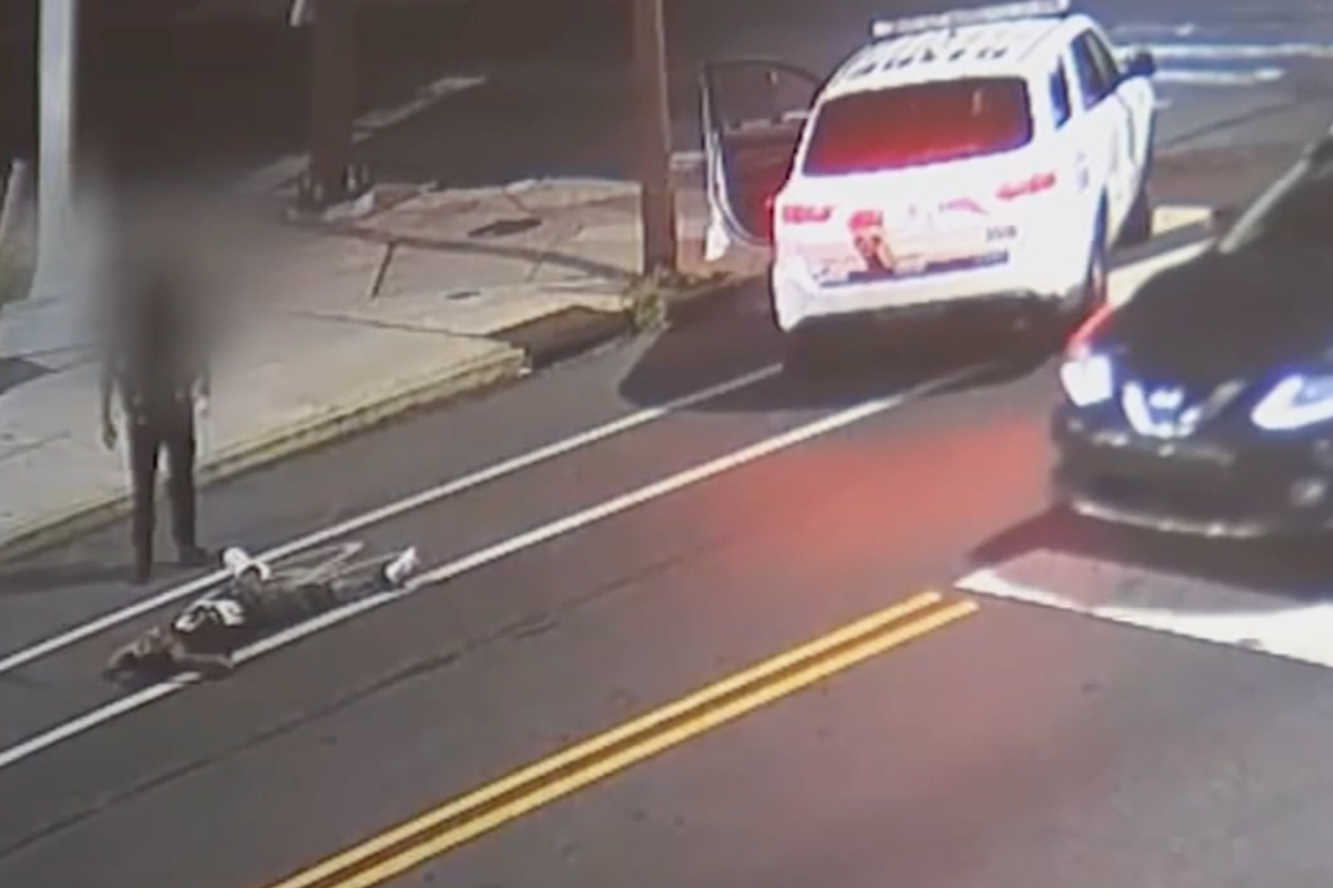 Cop used his foot to nudge man lying in street before leaving him to be hit by car