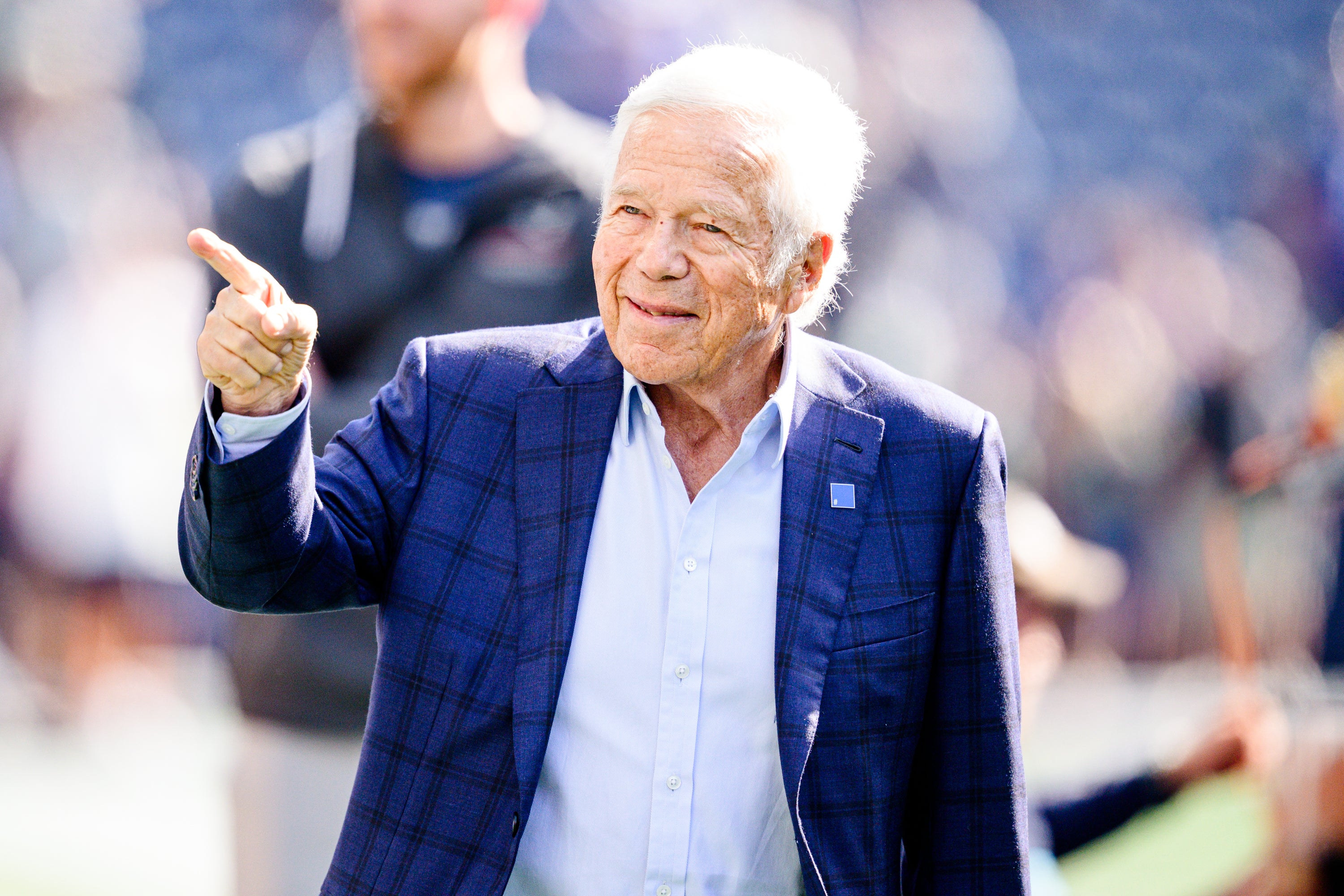 Owner Robert Kraft of the New England Patriots walks the field prior to the game between the Seattle Seahawks and the New England Patriots at Lumen Field