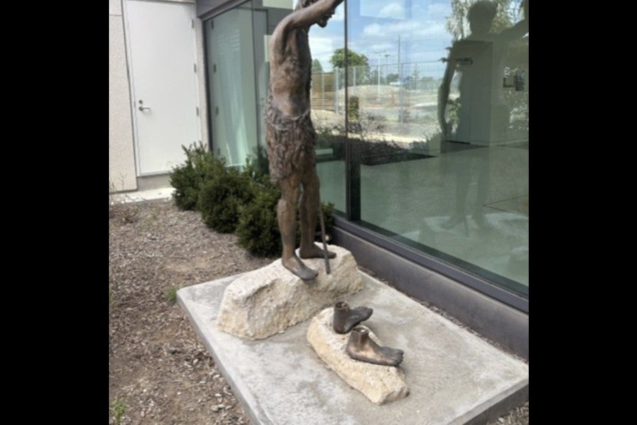 Authorities in Santa Ana, California, are searching for two men who cut down a $50,000 bronze Jesus statue from a Catholic church campus, leaving only its feet attached to the stone base