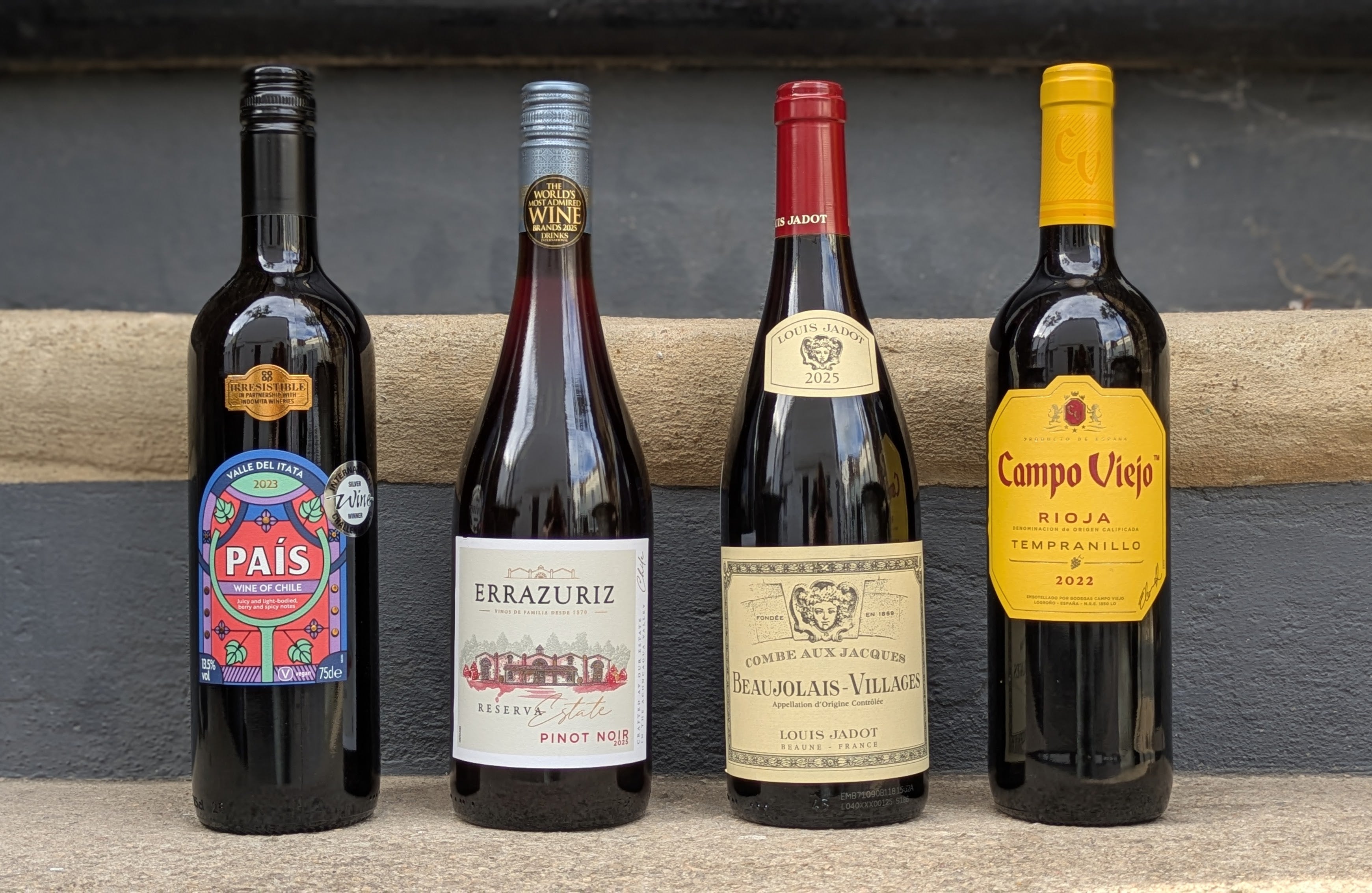 Reliable Rioja, Chilean Pinot Noir and Beaujolais prove the corner shop can do more than emergency plonk