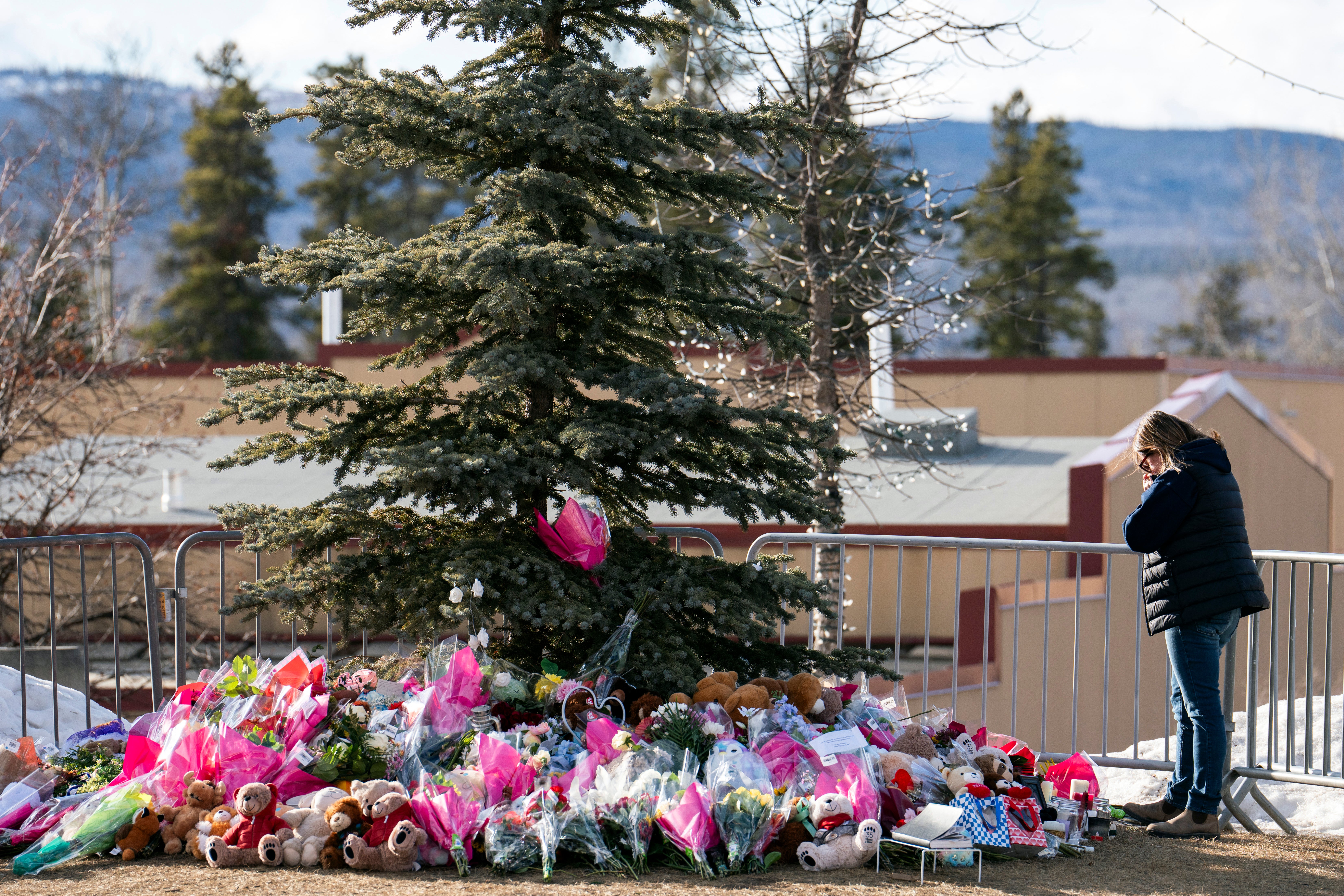 Mourner at the Tumbler Ridge memorial in February 2026