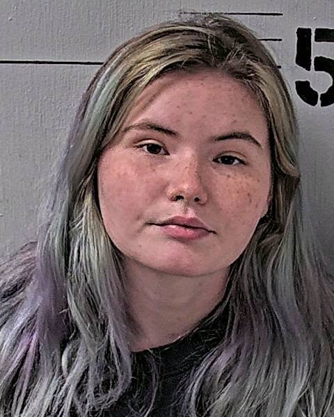 Michiko Burton, 19, was charged with simple assault and false imprisonment, which is a misdemeanor assault charge