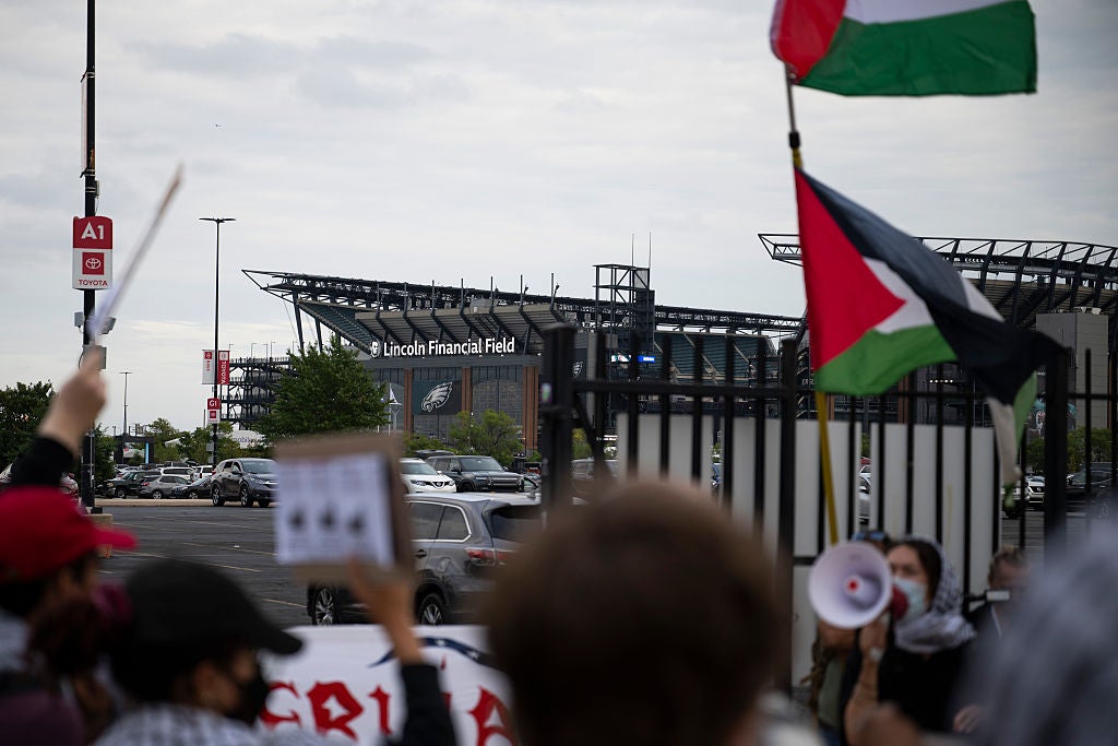 Protesters gather outside of Ed Sheeran's Philadelphia concert on Saturday (19 September)