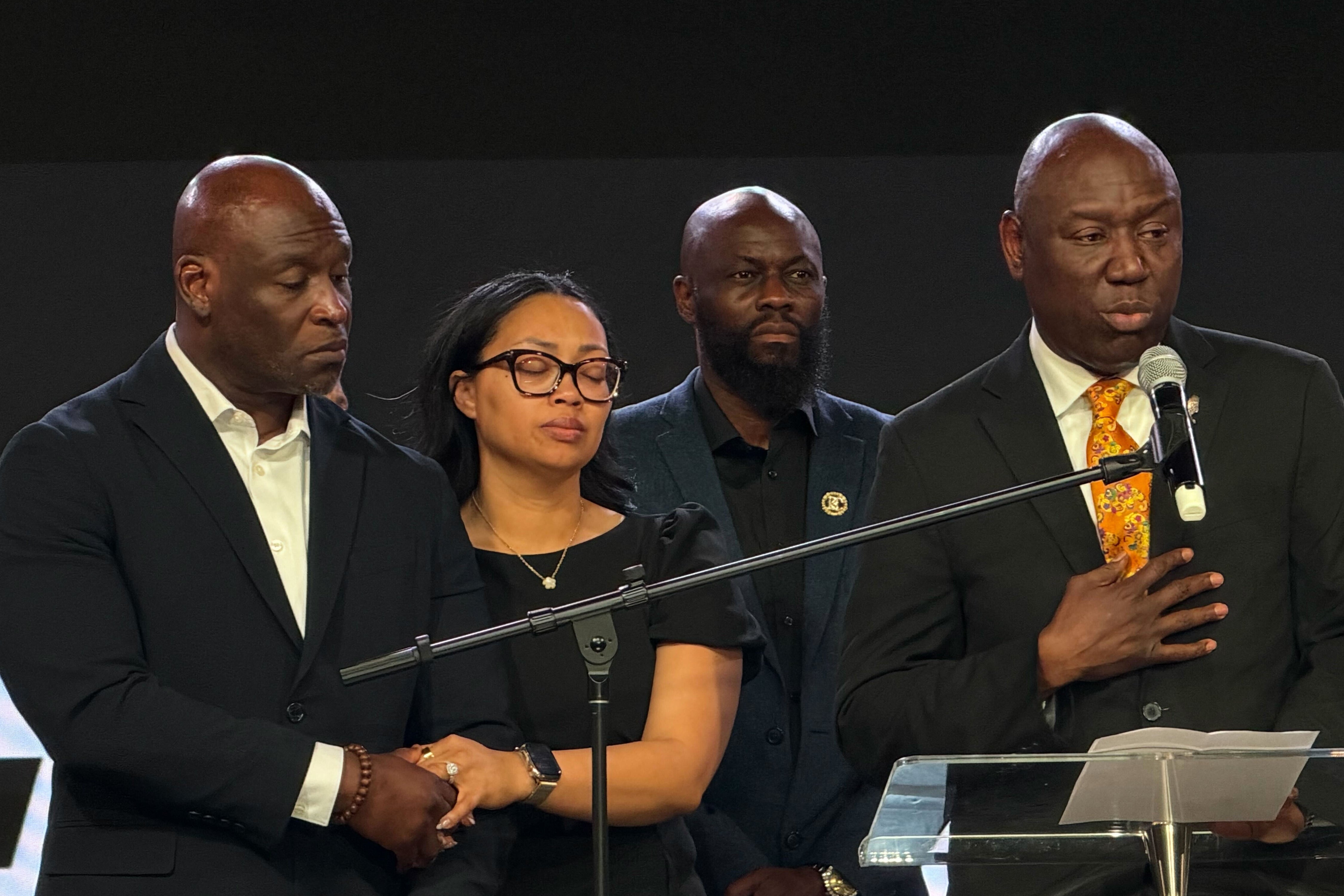Ben Crump, right, an attorney for the family of Nolan Wells, speaks at a news conference in Stonecrest, Ga., Thursday, Sept. 22, 2026, accompanied by Wells' parents, Elmore and Christine Wonsley