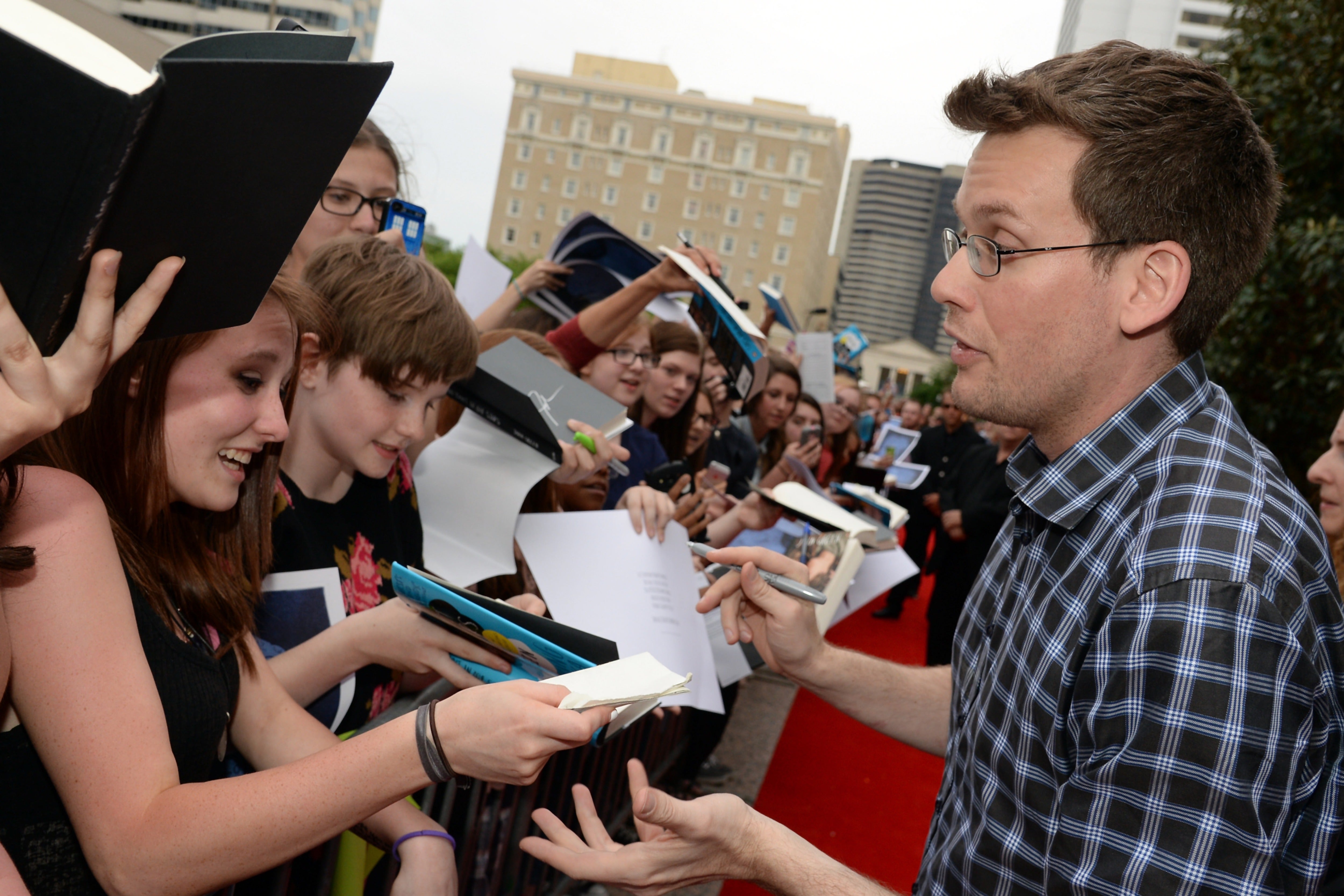 John Green greets fans at the premiere of ‘The Fault in Our Stars’