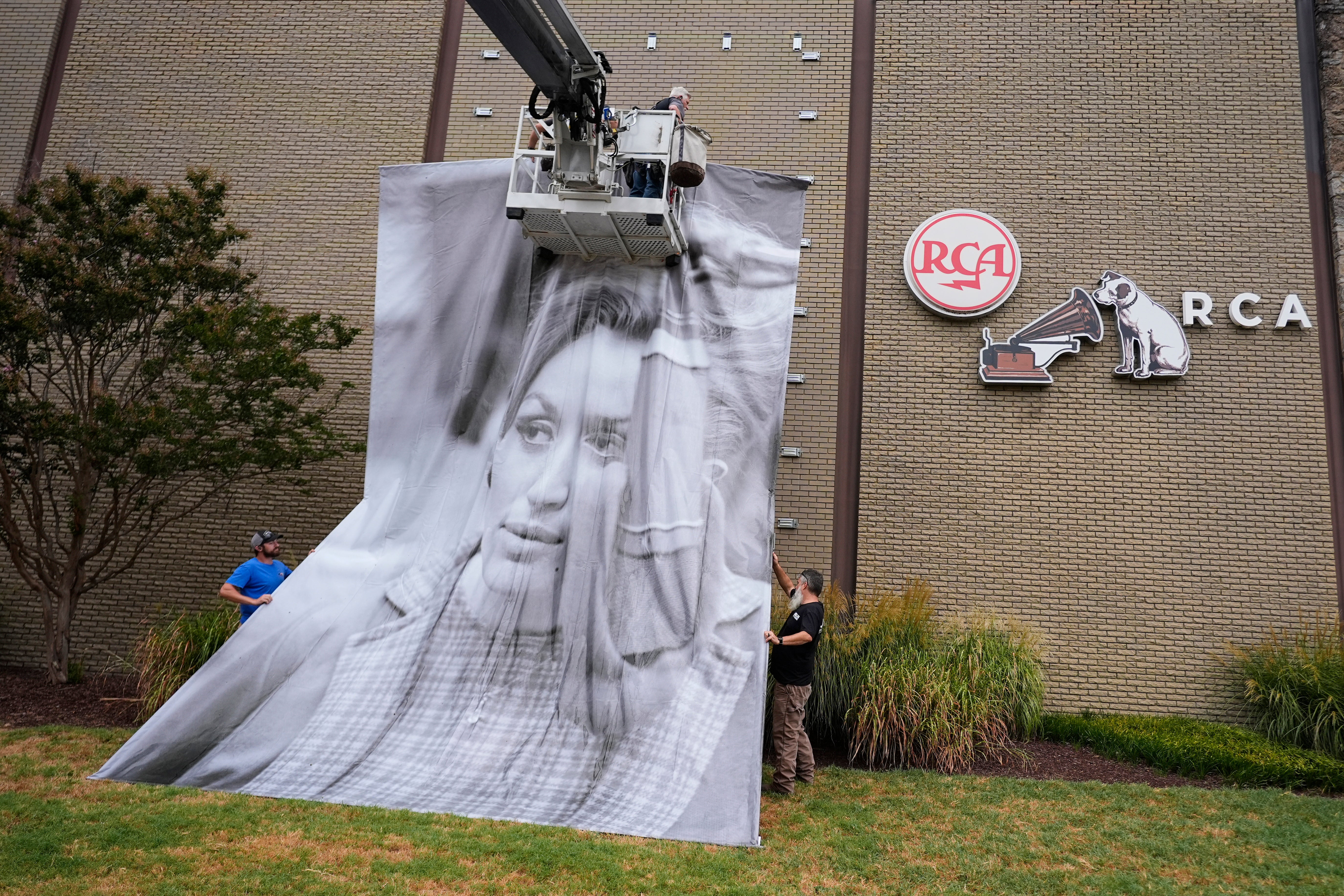 A portrait of the late Dolly Parton is installed outside RCA Studio A, Wednesday, Sept. 23