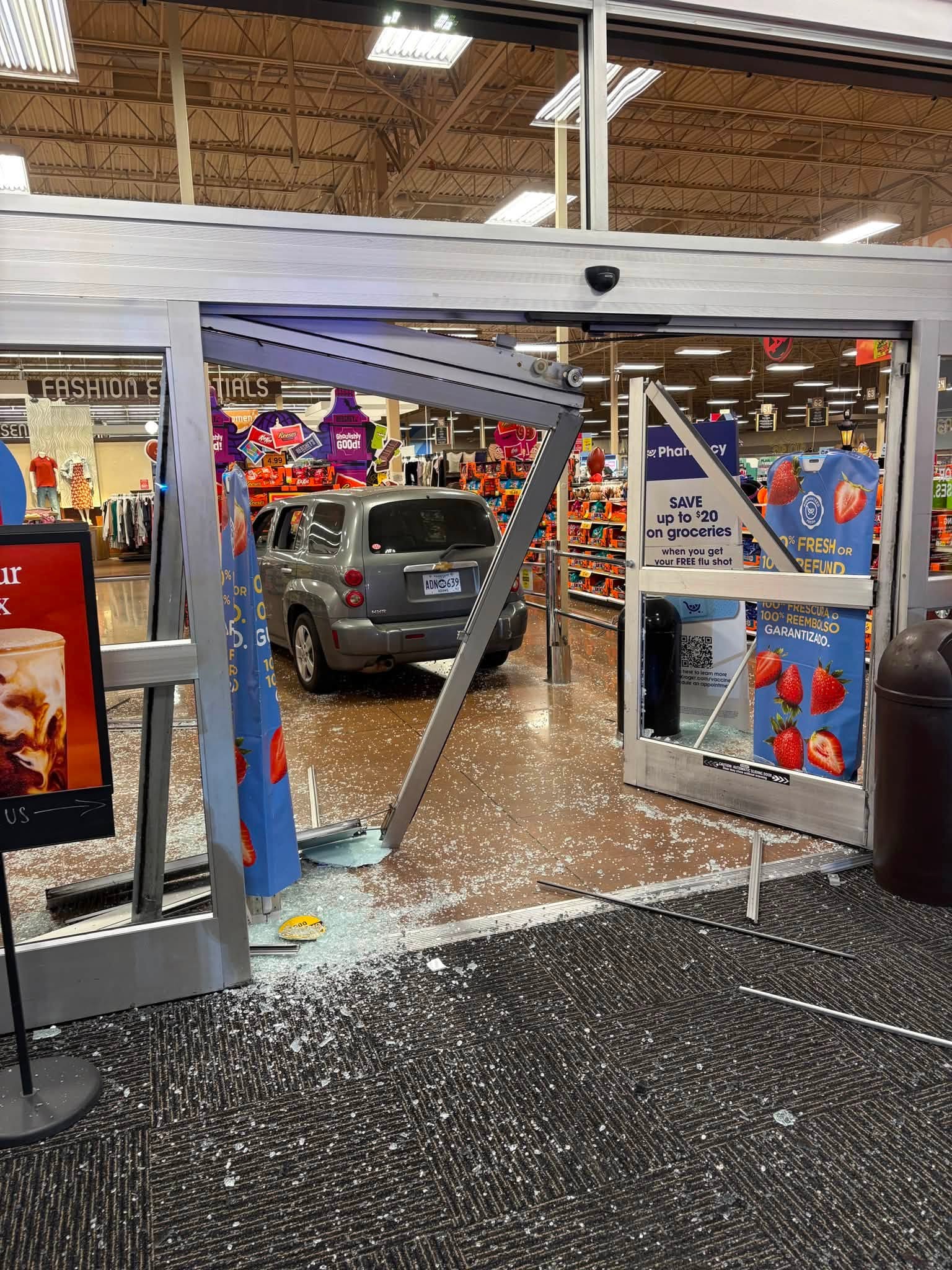 Photos shared by police show extensive damage to the storefront following the incident