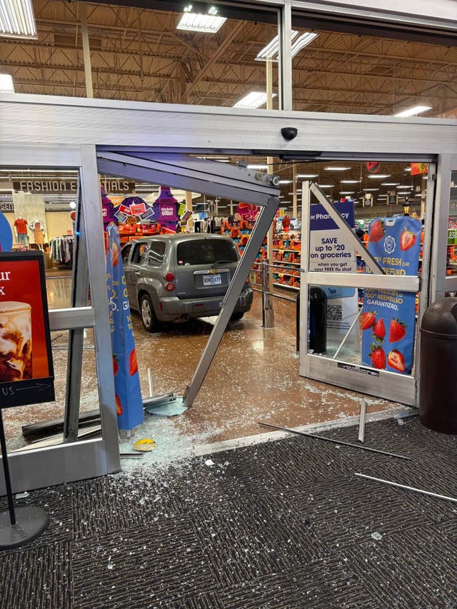 Photos shared by police show extensive damage to the storefront following the incident