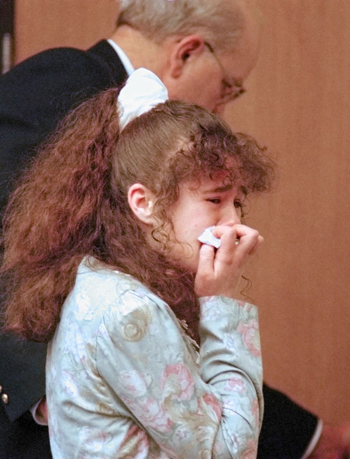 Pike is escorted from Knox County Criminal Court in Knoxville, Tennessee, US, on March 30, 1996, after being sentenced to death
