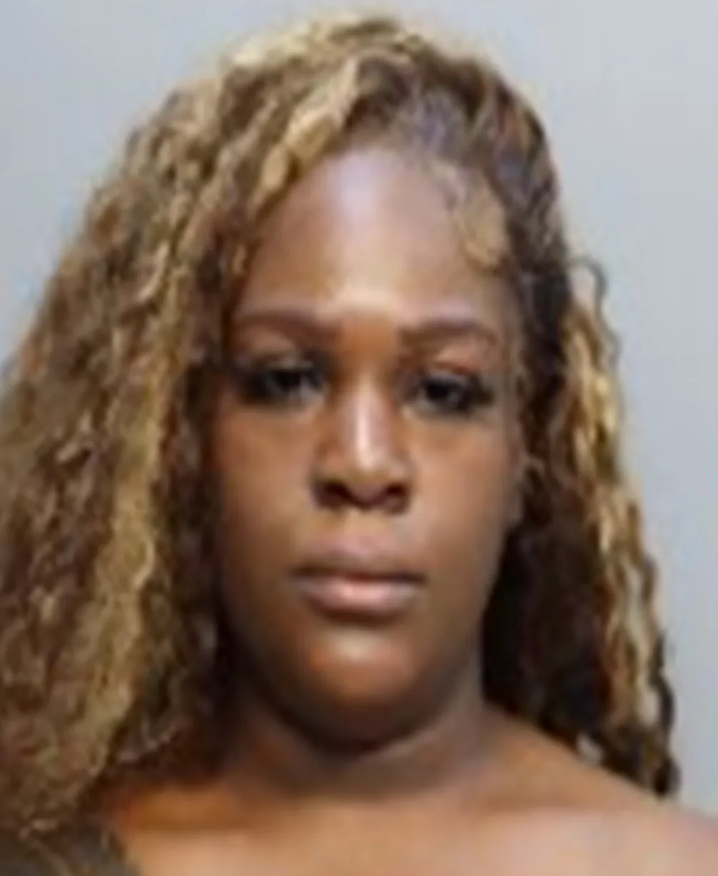 Florida mom Nathalie Belizaire was arrested after leaving her children to go on a cruise