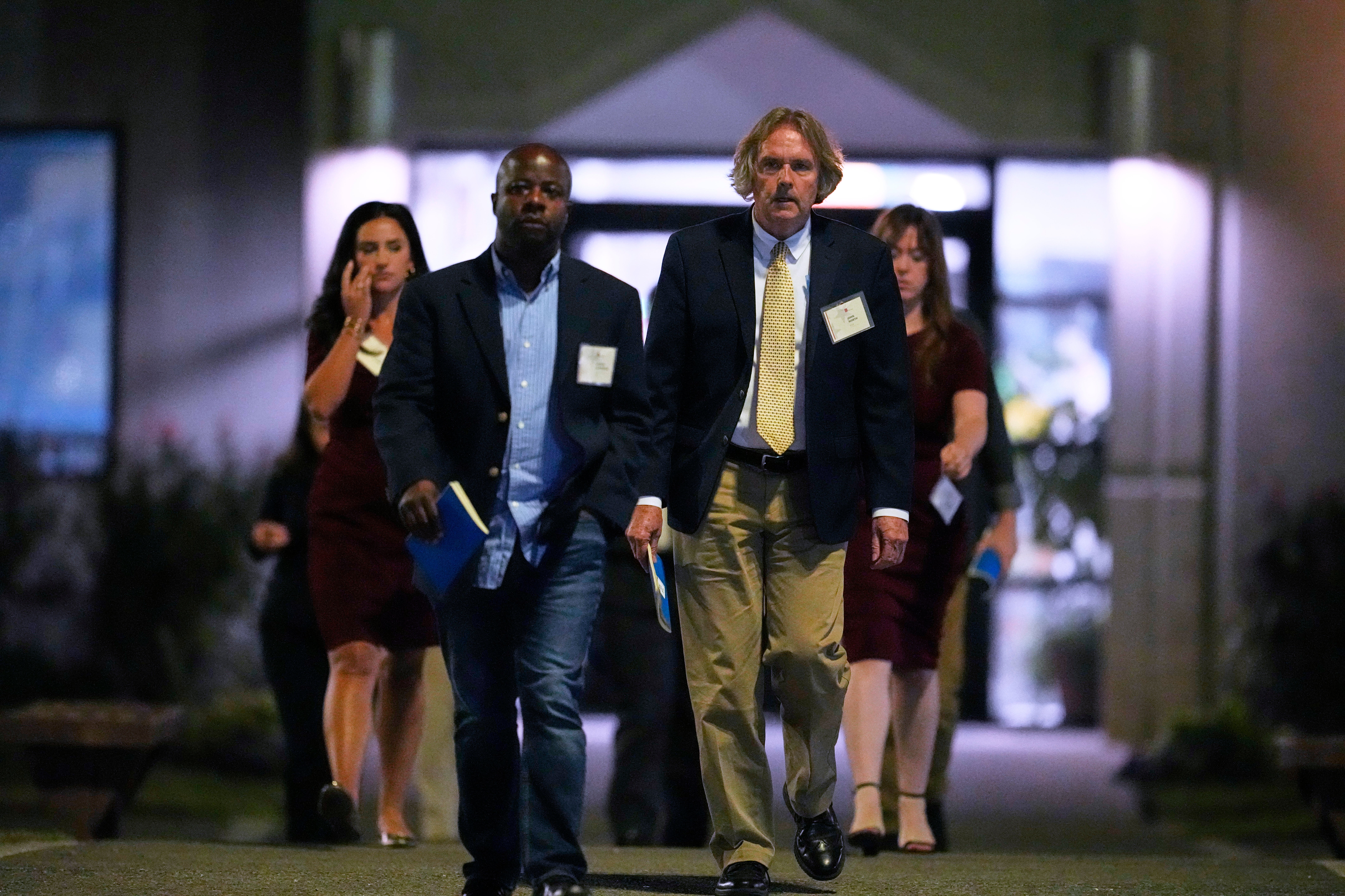 Media witnesses leave Riverbend Maximum Security Institution after the execution of Christa Pike